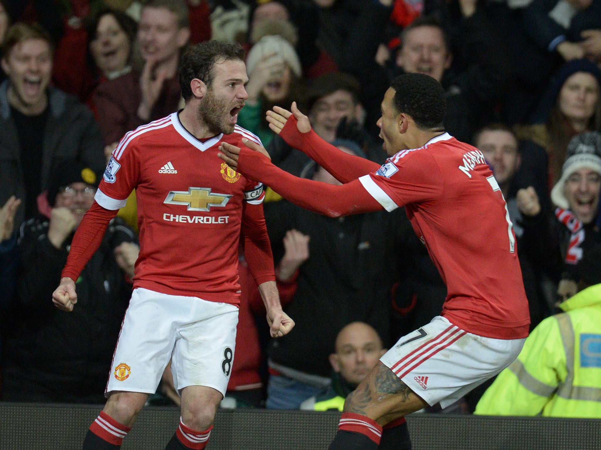 Manchester United midfielder Juan Mata celebrates his strike