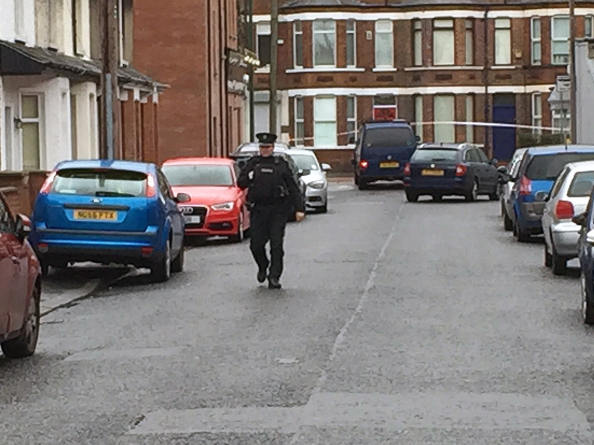 The van (centre, top) under which a device exploded in east Belfast, leaving a man injured