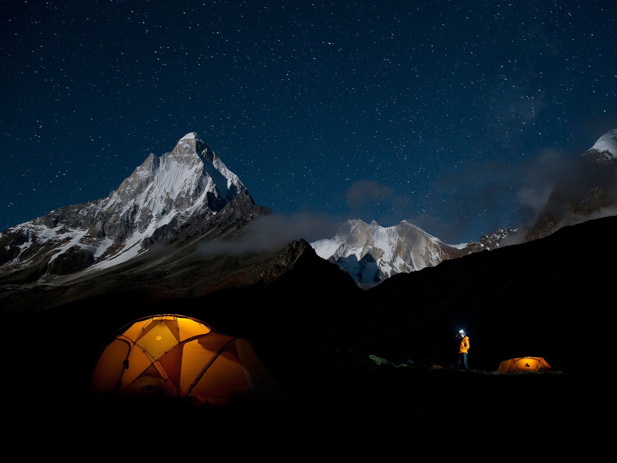 Ozturk checks out the stars above basecamp the night before the approach to the base of the route