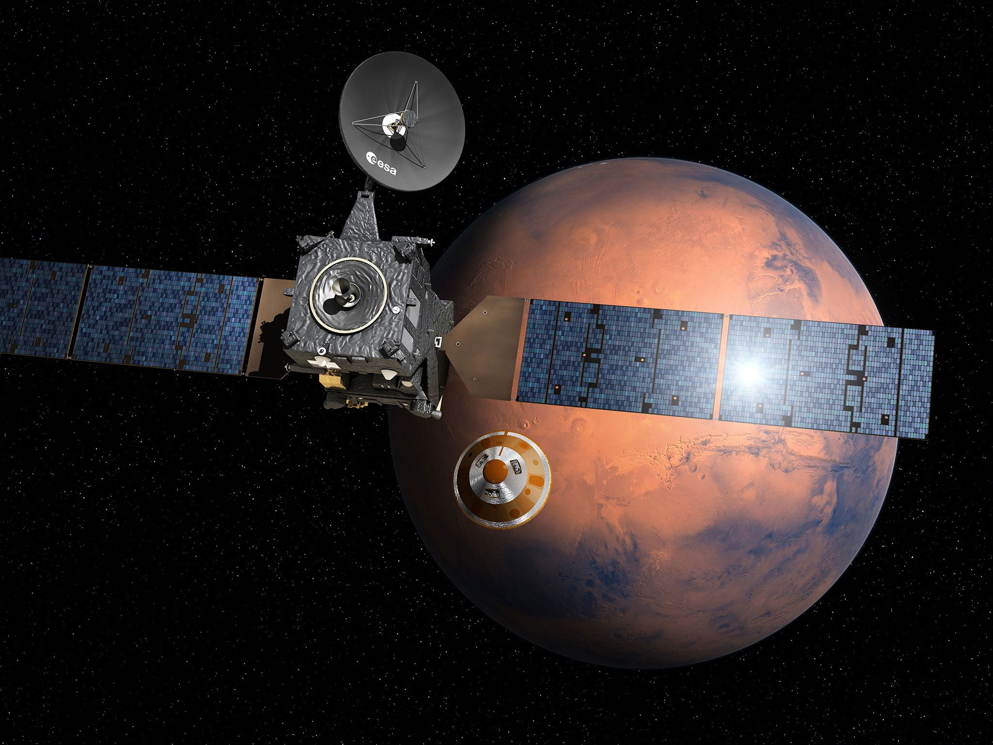 An artist's impression depicting the separation of the ExoMars 2016 entry, descent and landing demonstrator module, named Schiaparelli, from the Trace Gas Orbiter