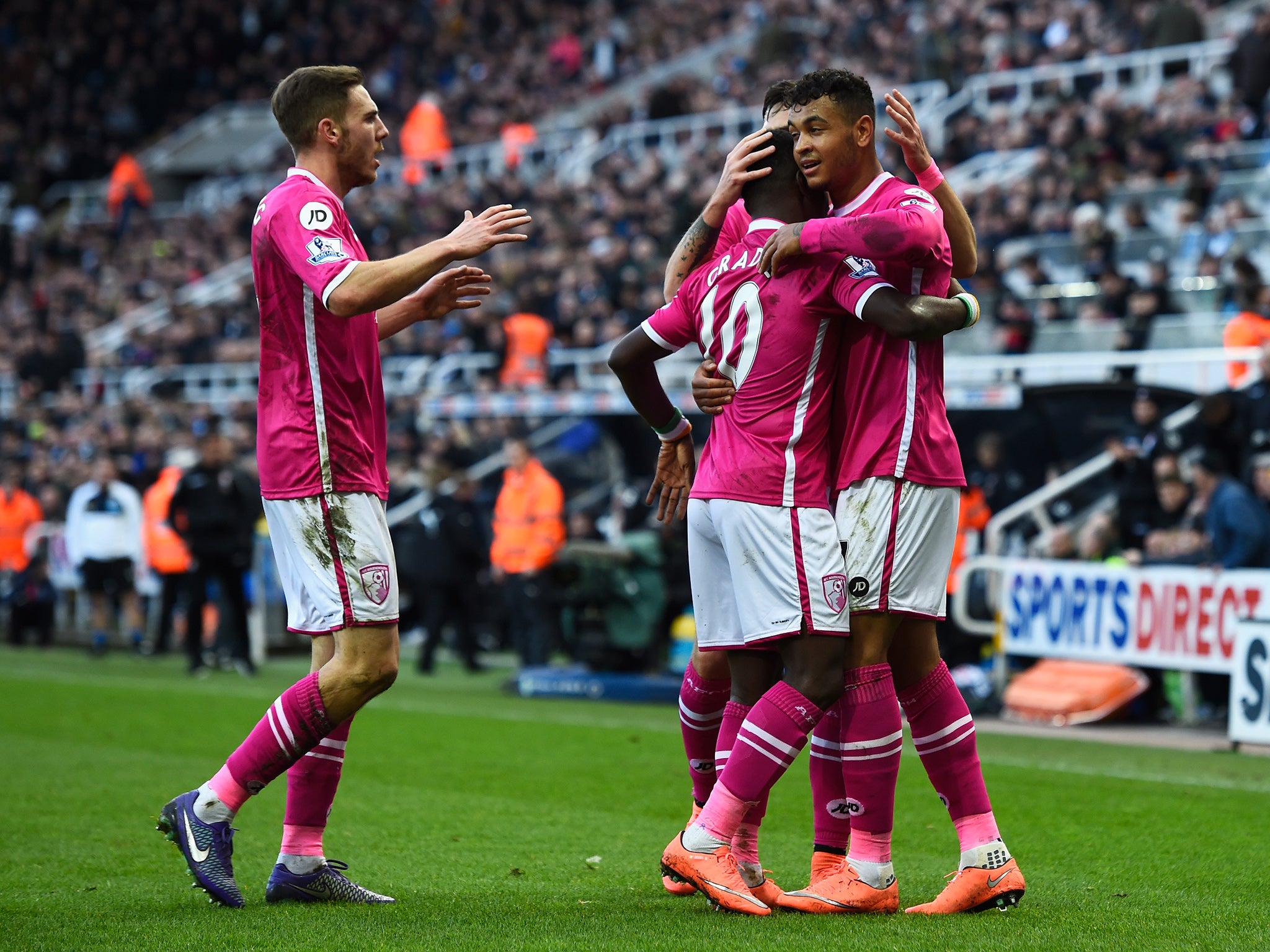 Bournemouth's players celebrate taking the lead at Newcastle last week