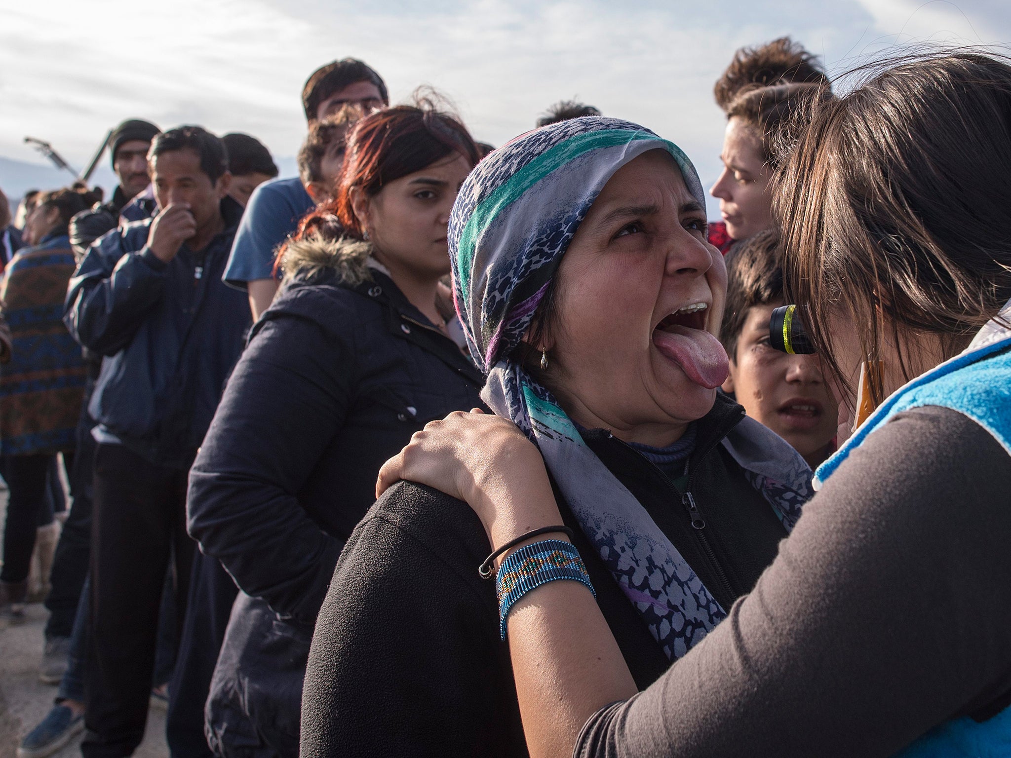 Refugees waiting to enter Macedonia undergo medical checks in the refugee camp at the border near Idomeni