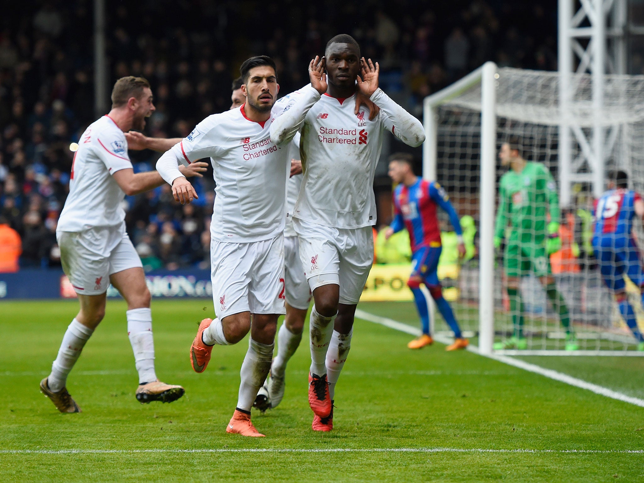 Liverpool striker Christian Benteke celebrates scoring the winning penalty against Crystal Palace