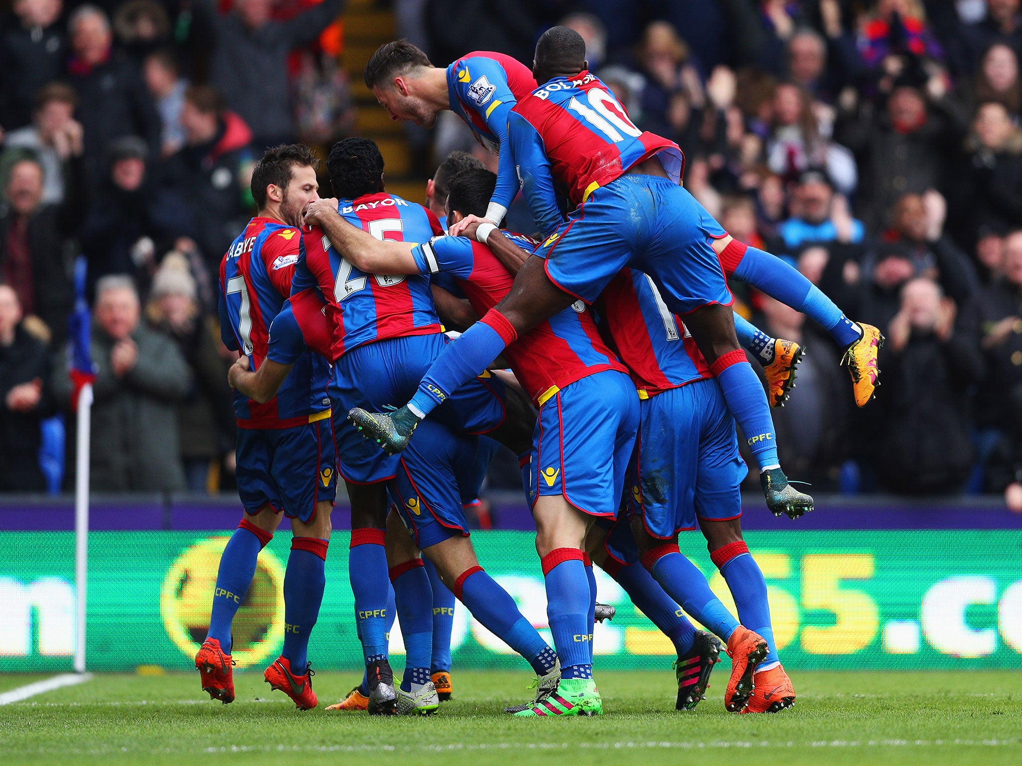 Crystal Palace players celebrate Joe Ledley's opening goal against Liverpool