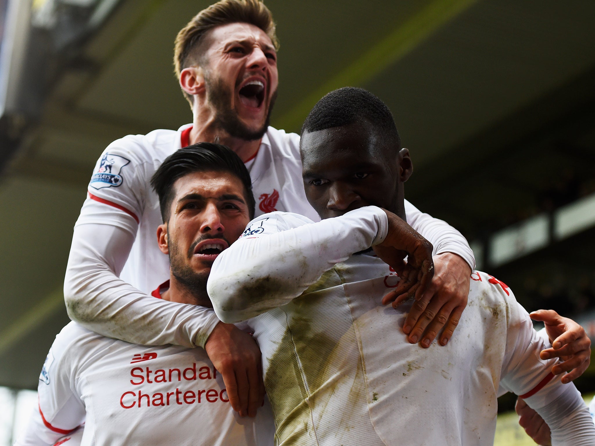 Christian Benteke (right) is mobbed after scoring the winning goal