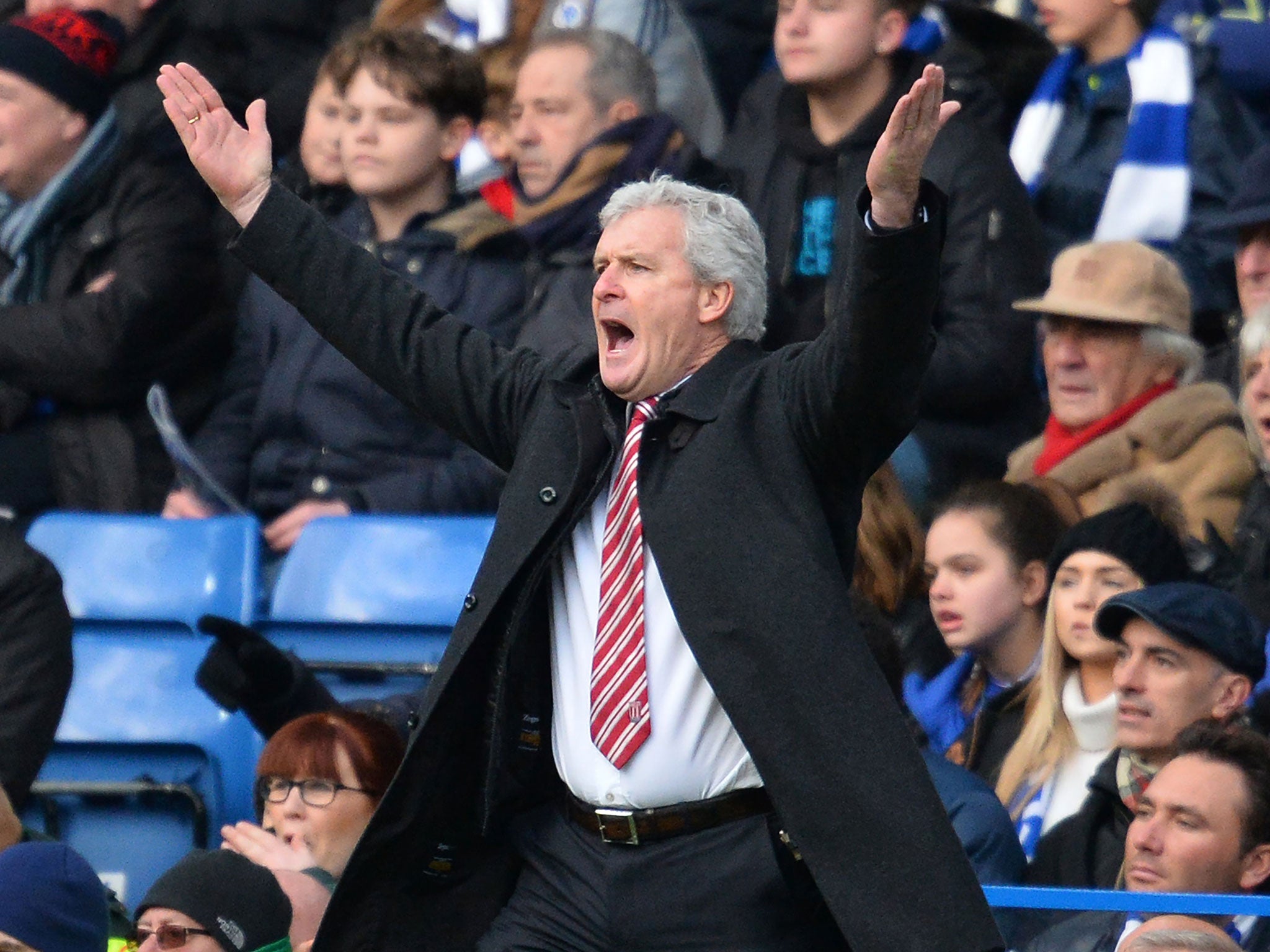 Stoke City's manager Mark Hughes gestures on the touchline during the match between Chelsea and Stoke City at Stamford Bridge