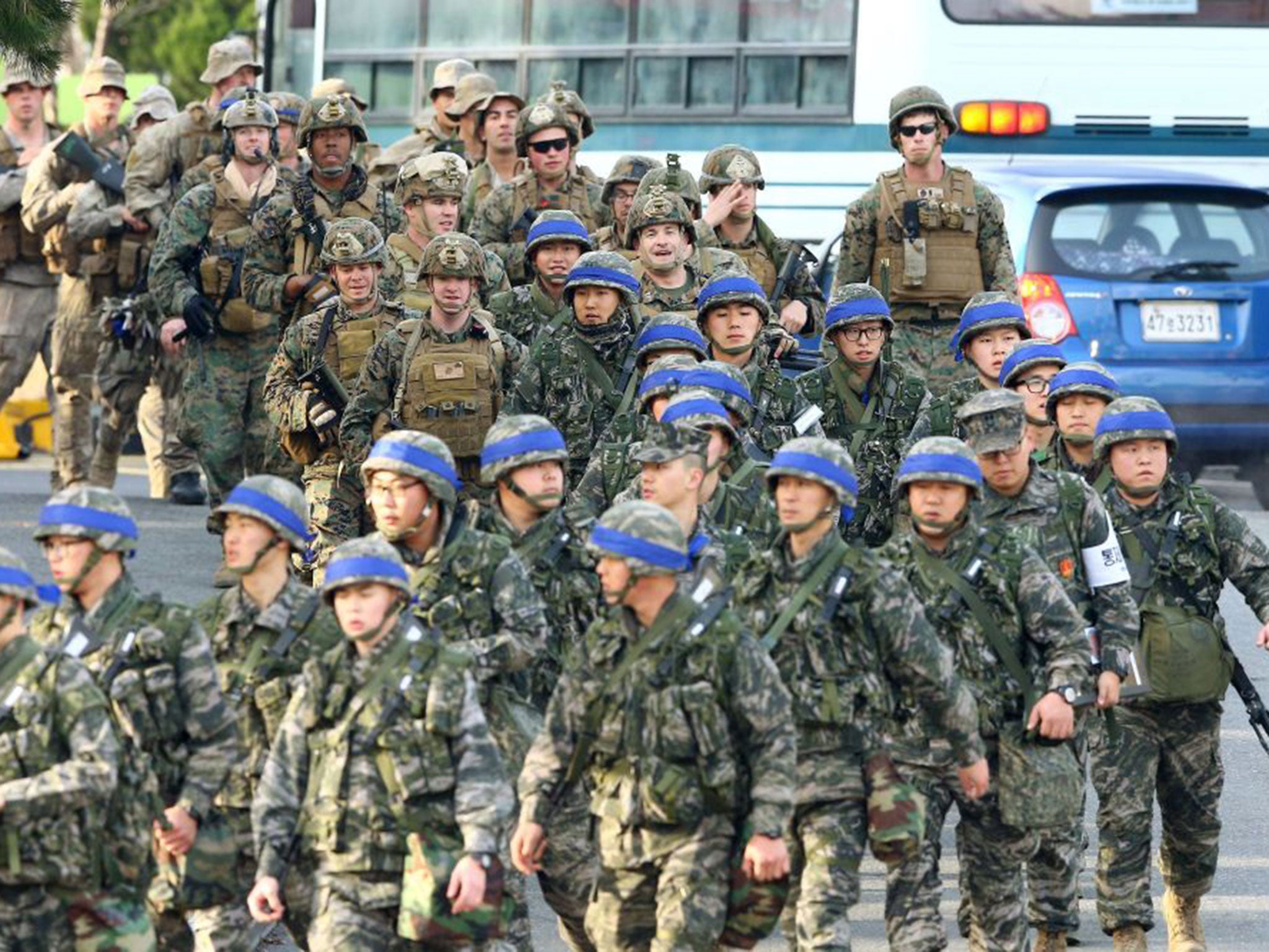 Marines from South Korea, front, and the US, top, before a joint military drill in the port of Pohang