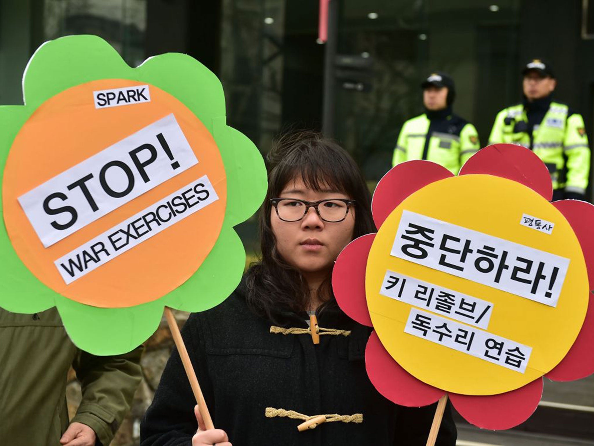 &#13;
An anti-war activist at a rally against the exercises near the US embassy in Seoul &#13;