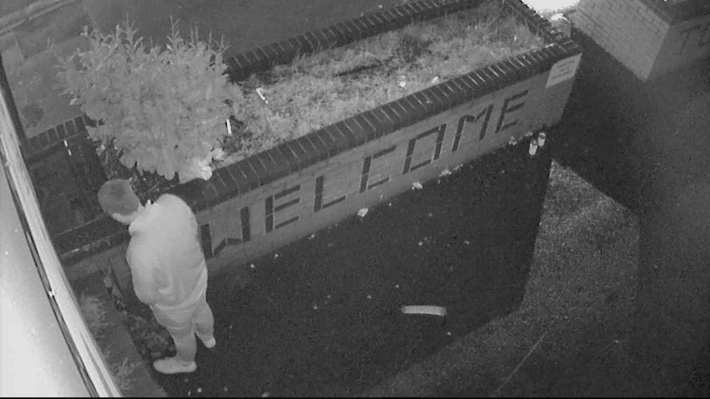 A man urinating next to the clinic