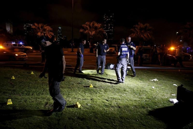 &#13;
Israeli police search the Jaffa port area of Tel Aviv. Amir Cohen/Reuters&#13;