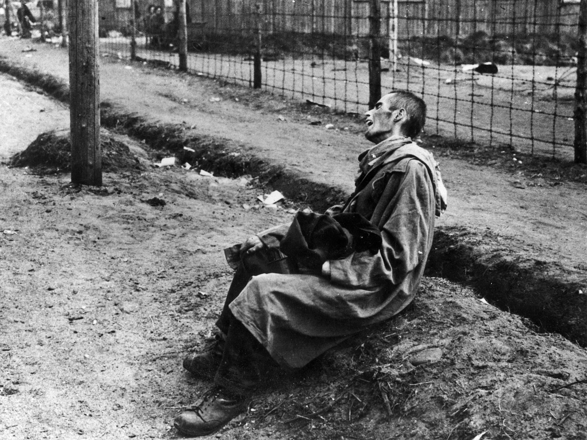 &#13;
Leonard Berney described scenes of ‘starving, emaciated prisoners’ at the Nazi concentration camp (Keystone/Getty)&#13;