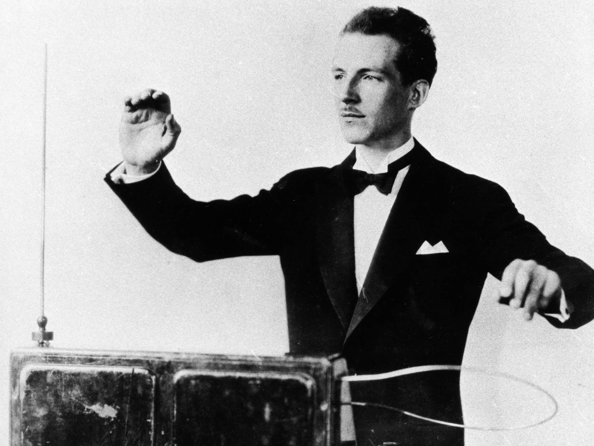 Leon Theremin playing the musical synthesizer he invented