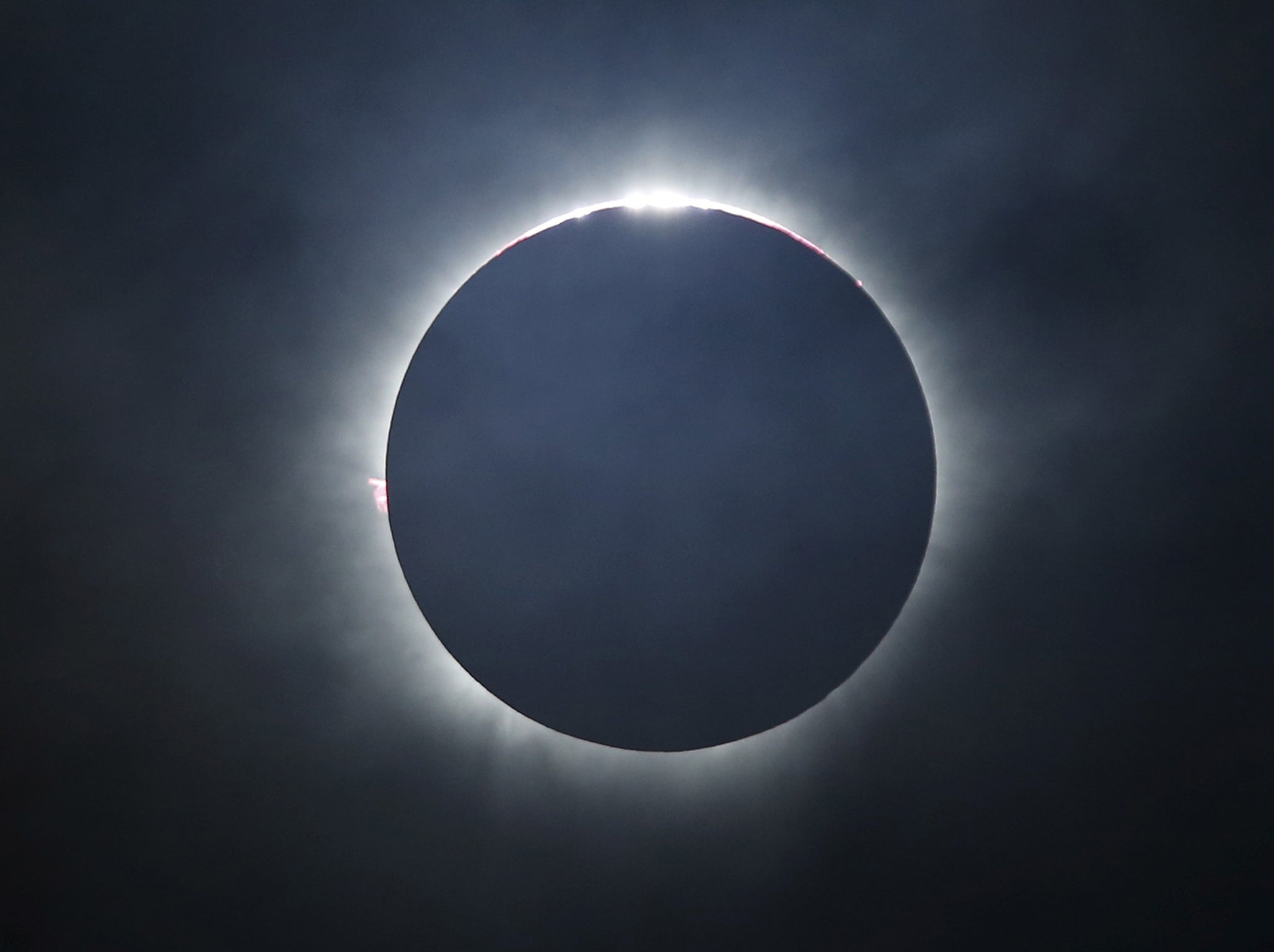 A solar eclipse is seen from the beach of Ternate island, Indonesia, March 9, 2016