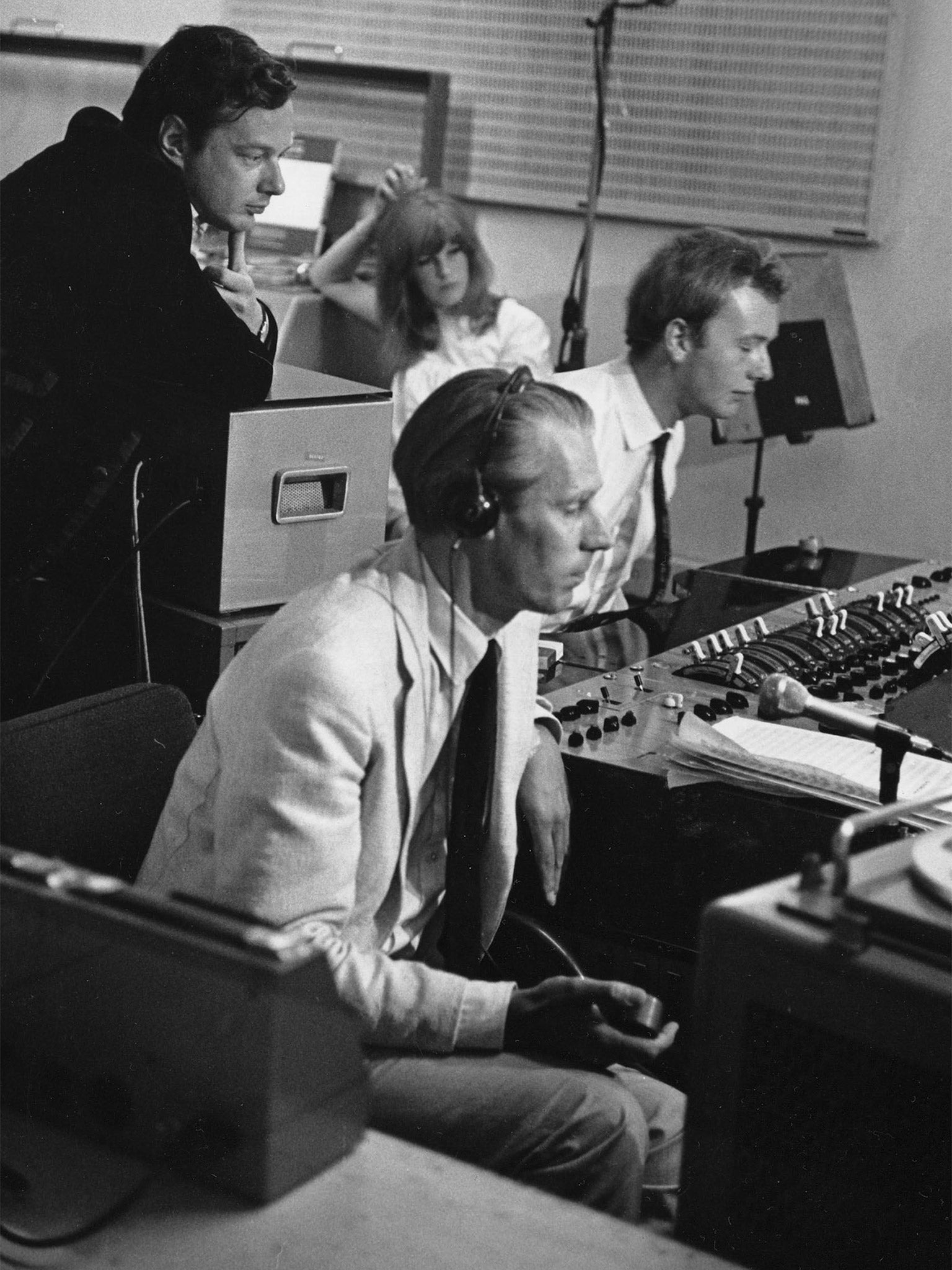 George Martin with Brian Epstein, standing, at Abbey Road in 1967 (Rex)