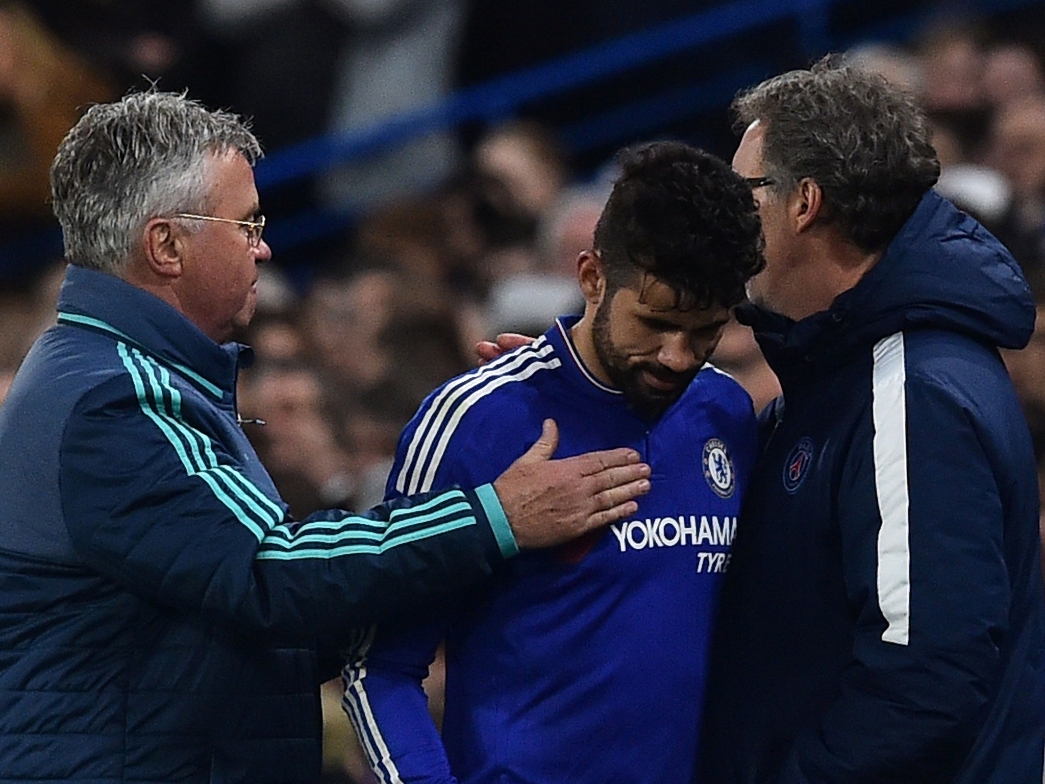 Chelsea striker Diego Costa receives commiserations from Guus Hiddink and Laurent Blanc