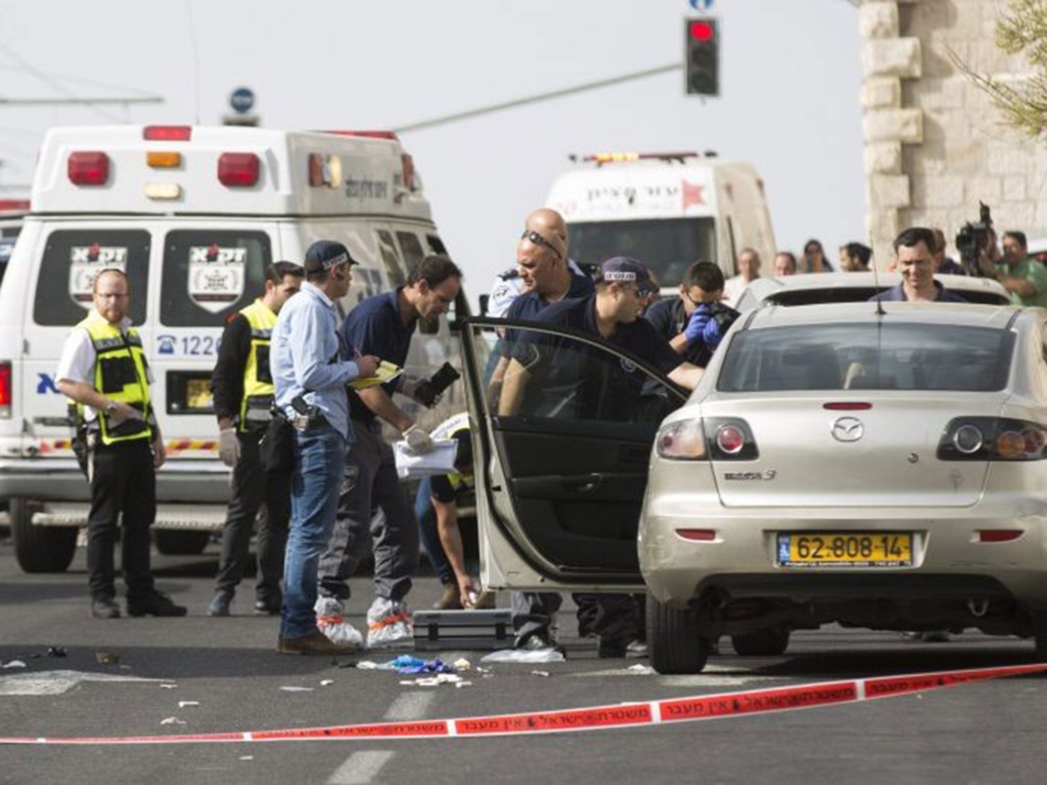 Israeli police at the scene of a shooting attack near Damascus Gate in the Old City of Jerusalem, 9 March 2016.