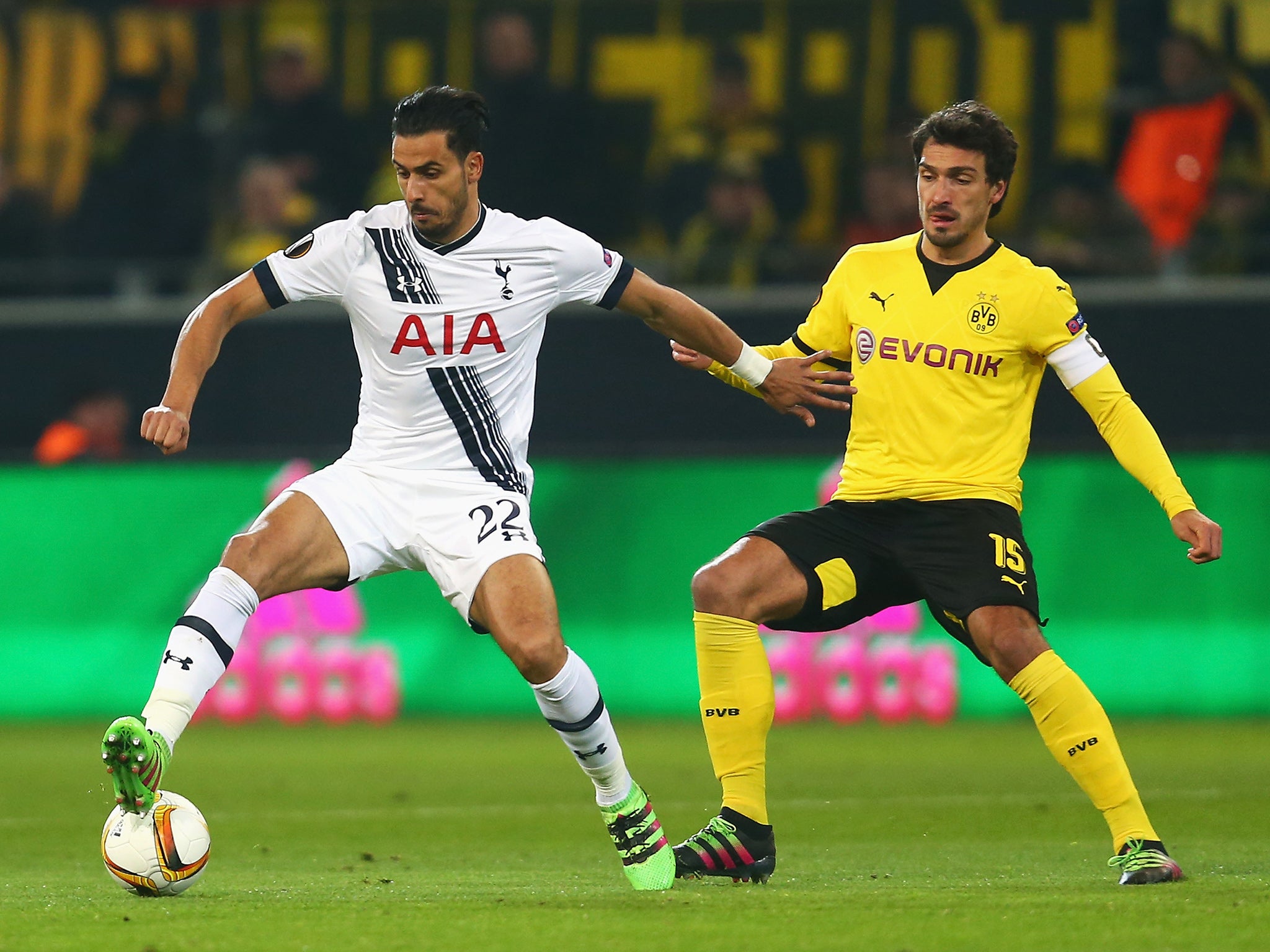 Nacer Chadli and Mats Hummels battle for the ball