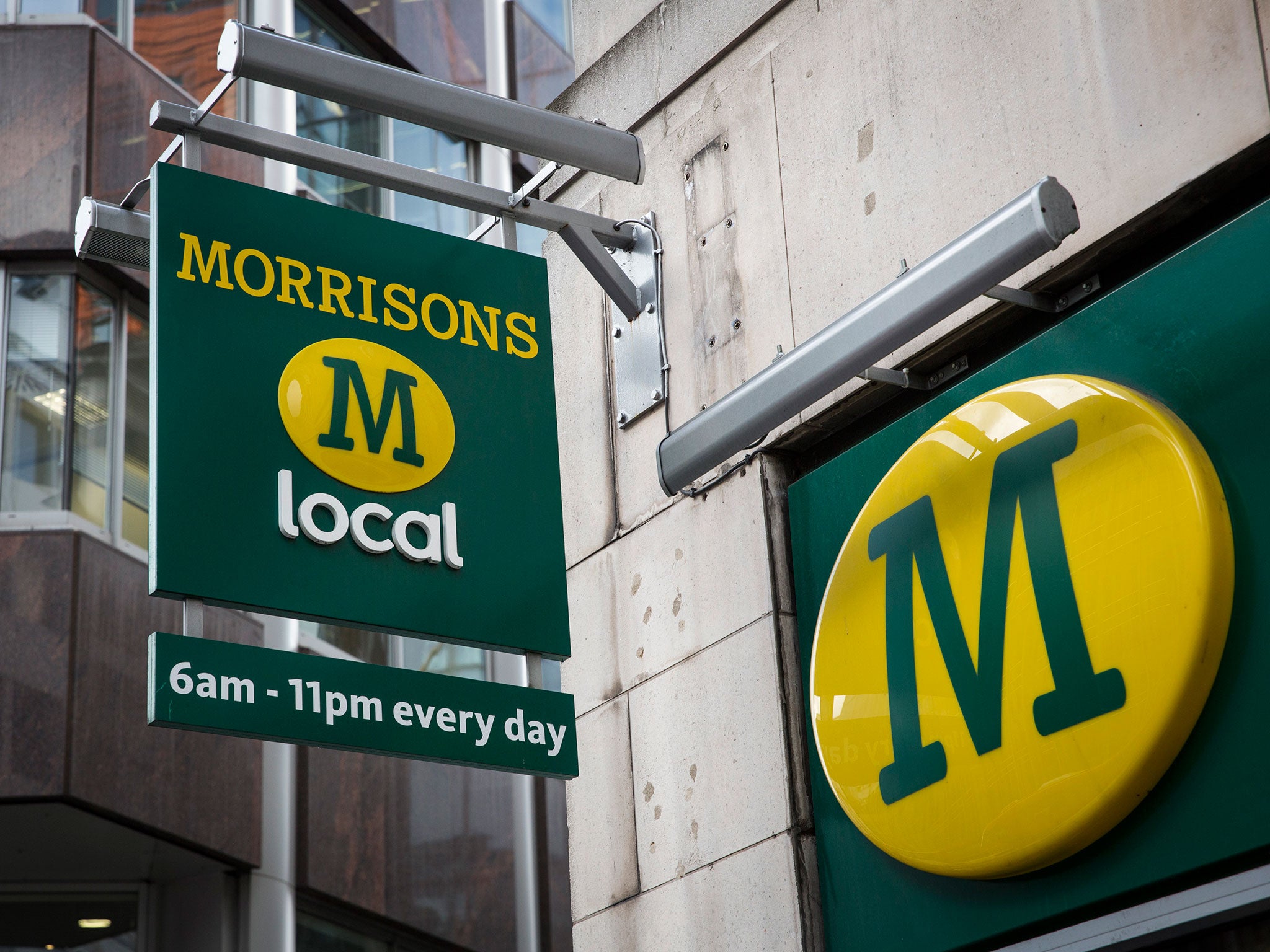 Morrisons' pre-tax profits hit £217m after a massive £792m loss a year earlier