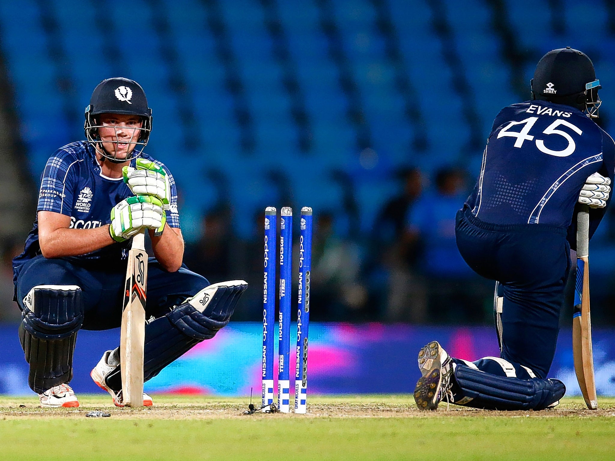 Mark Watt and Alasdair Evans look dejected as Scotland are beaten again in their World Twenty20 group match against Afghanistan in Nagpur