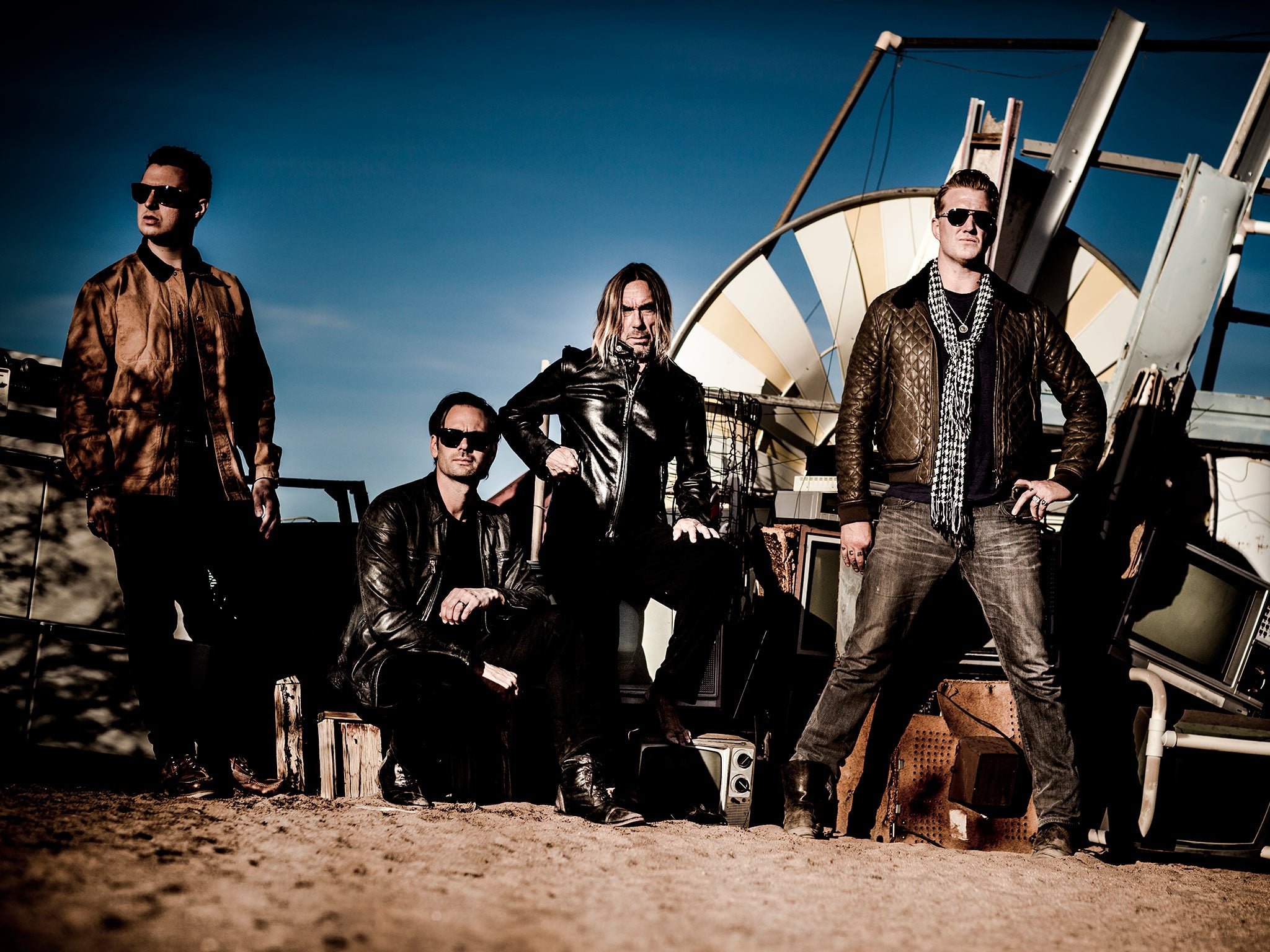 Iggy and his current band members, including Josh Homme