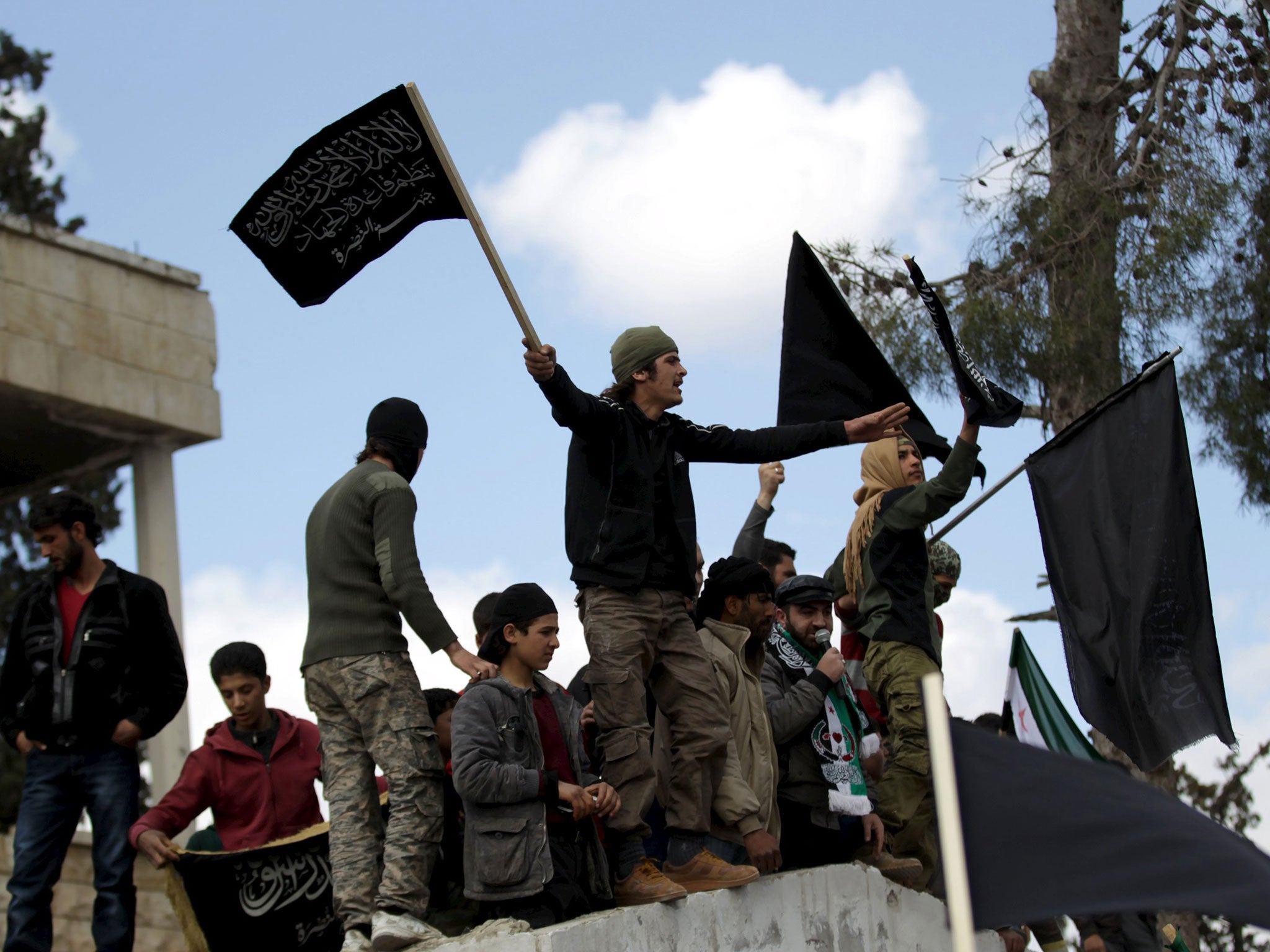 Jabhat al-Nusra supporters drowned out the pro-democracy protesters after crashing the protest