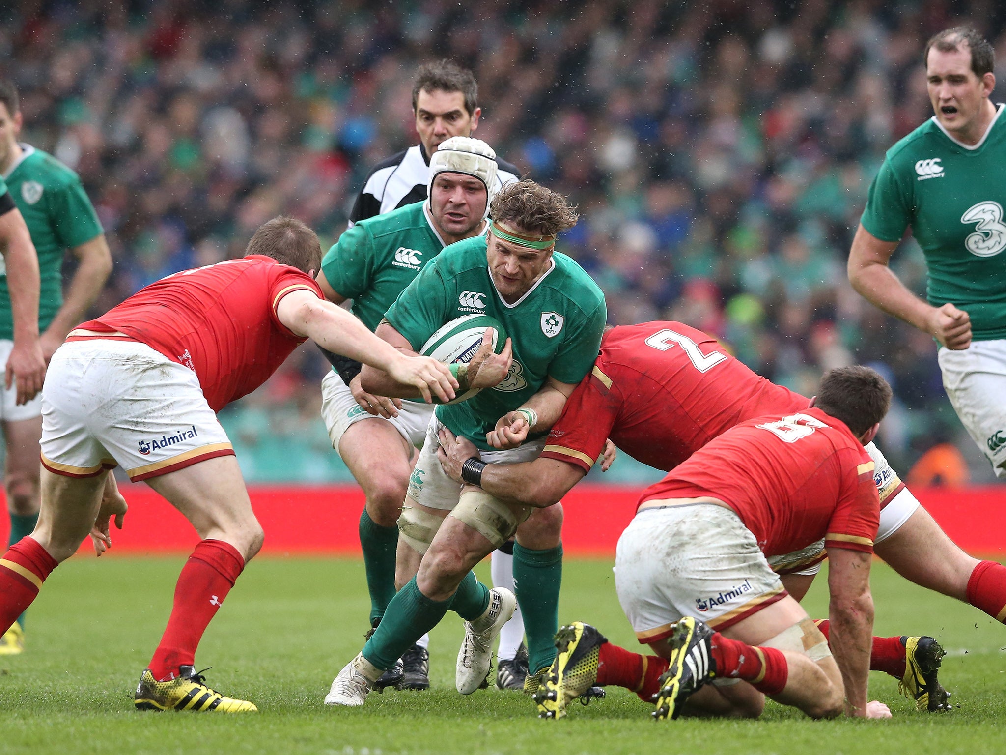 Jamie Heaslip of Ireland is tackled during the RBS Six Nations match between Ireland and Wales