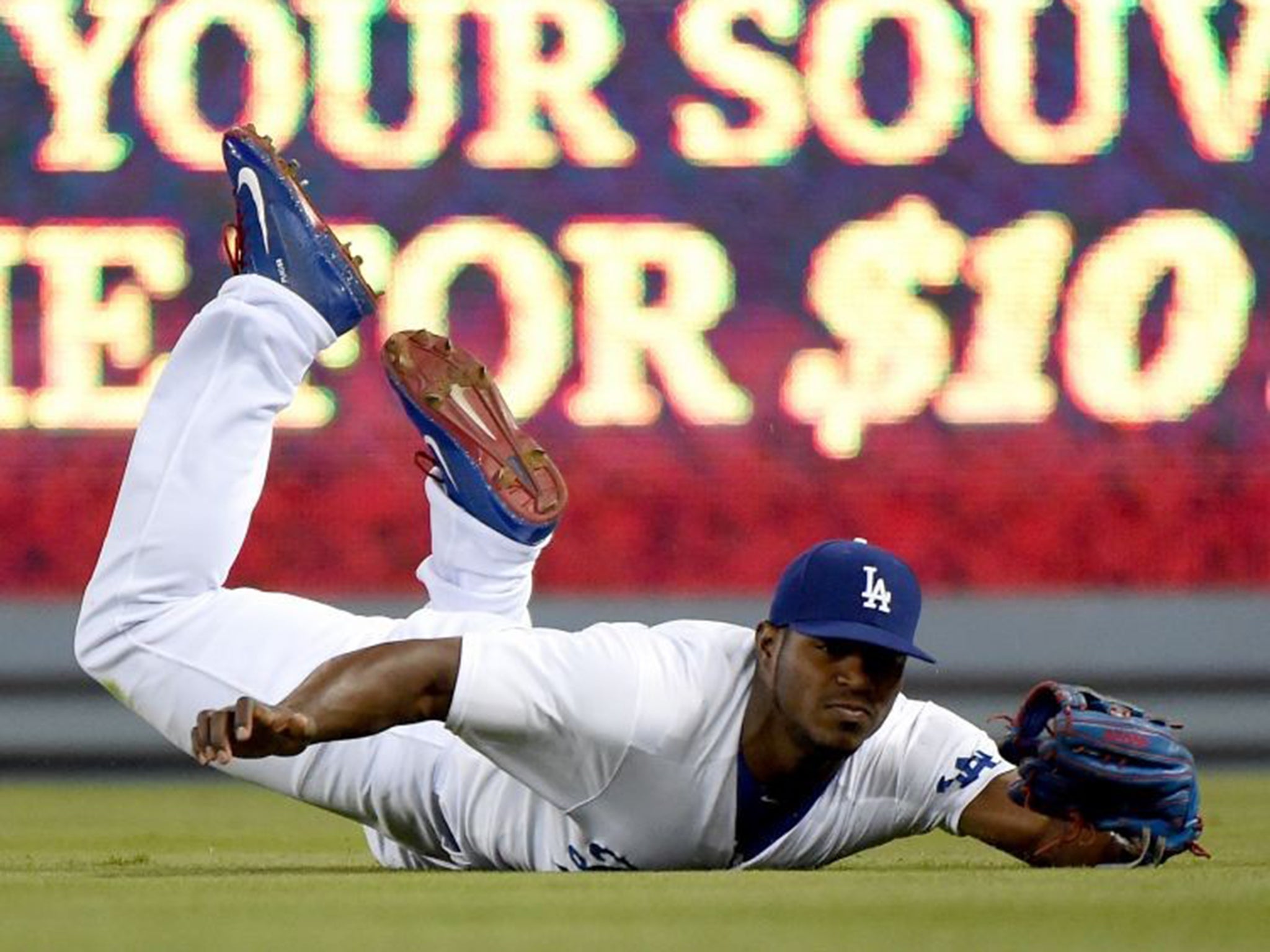 In 2012 Yasiel Puig was a migrant who used traffickers to help him defect from Cuba to the US. Now he earns millions playing for the Los Angeles Dodgers in Major League Baseball.