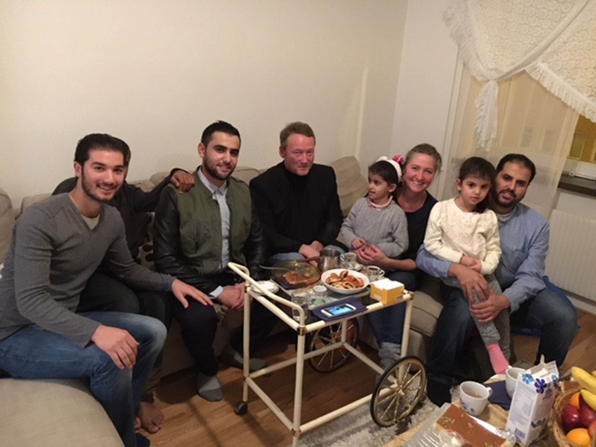 Lisbeth Zornig and Mikael Lindholm visiting the family where they have settled in Sweden