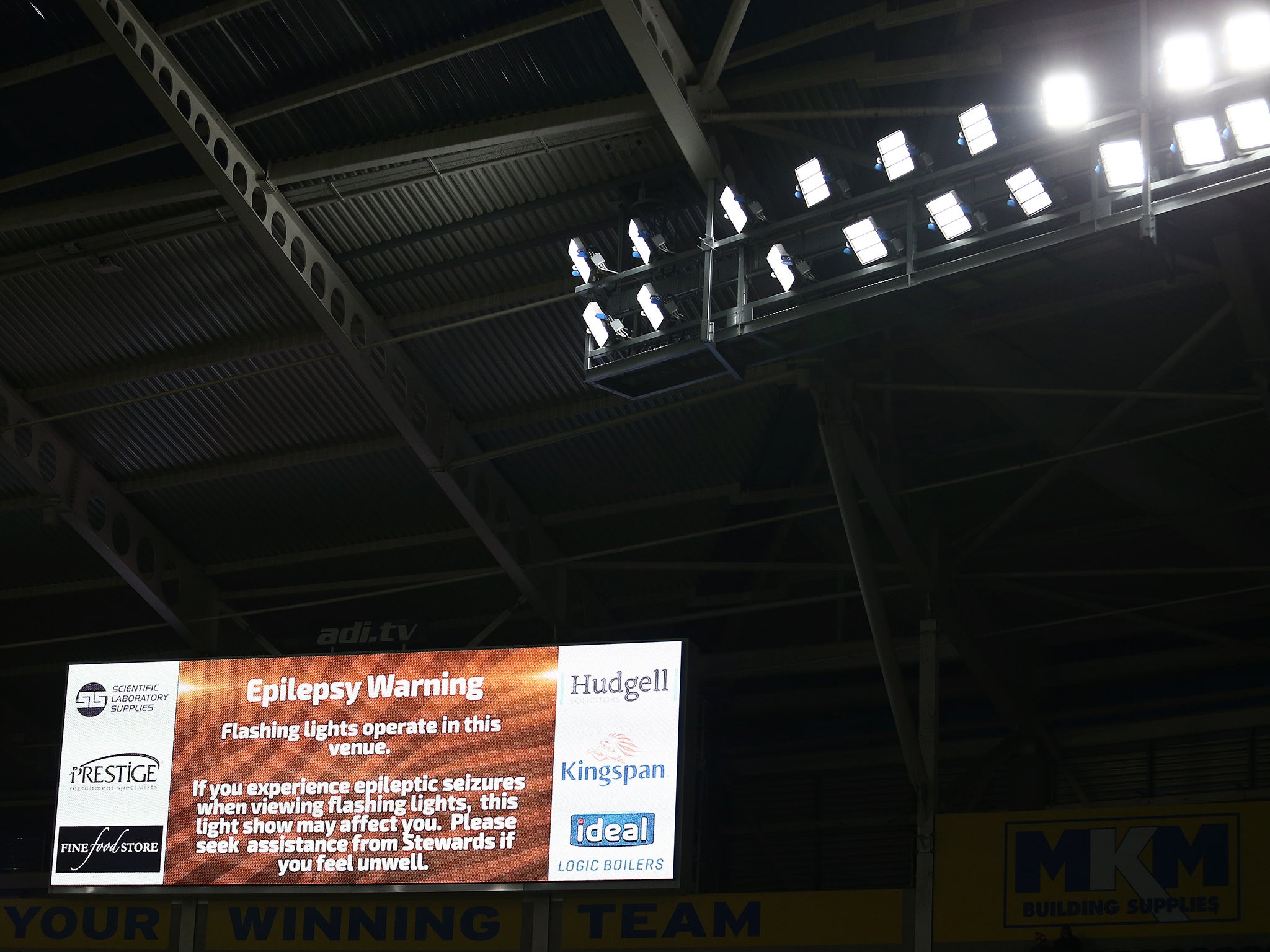 The jumbo screen at Arsenal's Emirates stadium gives an epilepsy warning ahead of a recent FA Cup match. The Epilepsy Society says almost four in 10 epilepsy-related deaths are avoidable