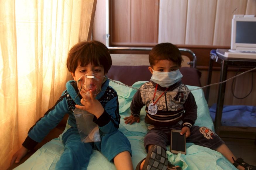 Children receive oxygen, after suffering from choking, at a hospital in Taza (Reuters)