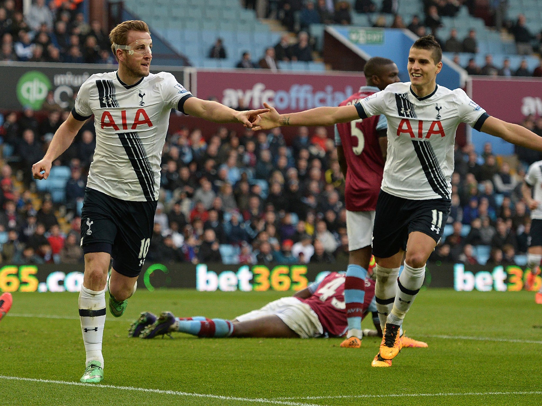 Harry Kane celebrates his second goal with team-mate Erik Lamela