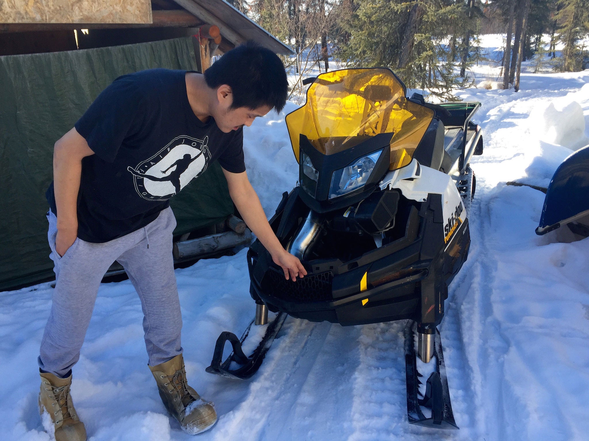 Arnold Demoski was charged with colliding his snowmobile with the Iditarod trail sled dog race teams, near Nulato, Alaska. Demoski, 26, of Nulato was arrested on suspicion of assault, reckless endangerment, reckless driving and six counts of criminal mischief