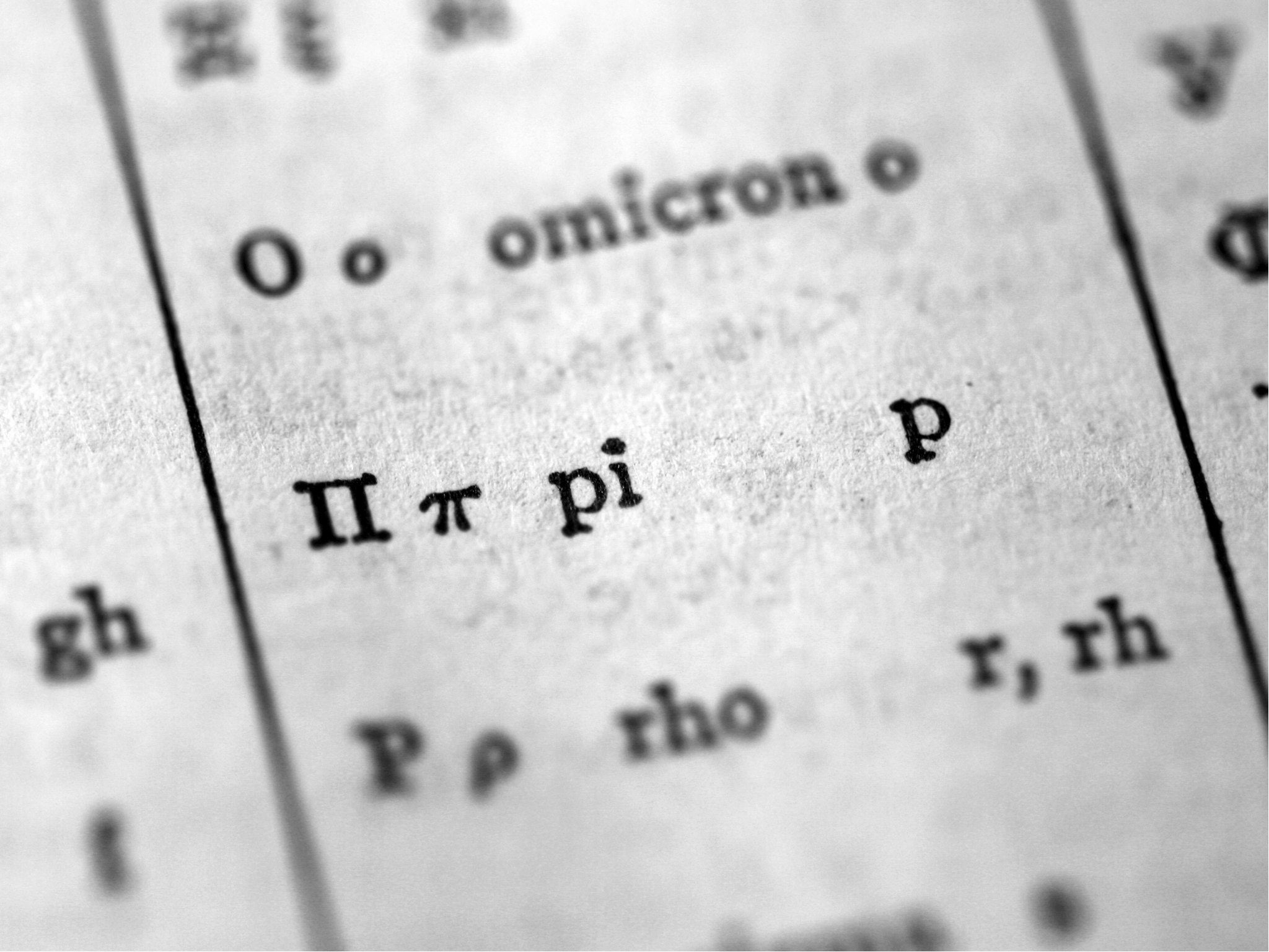 The Greek letter pi in an antique dictionary