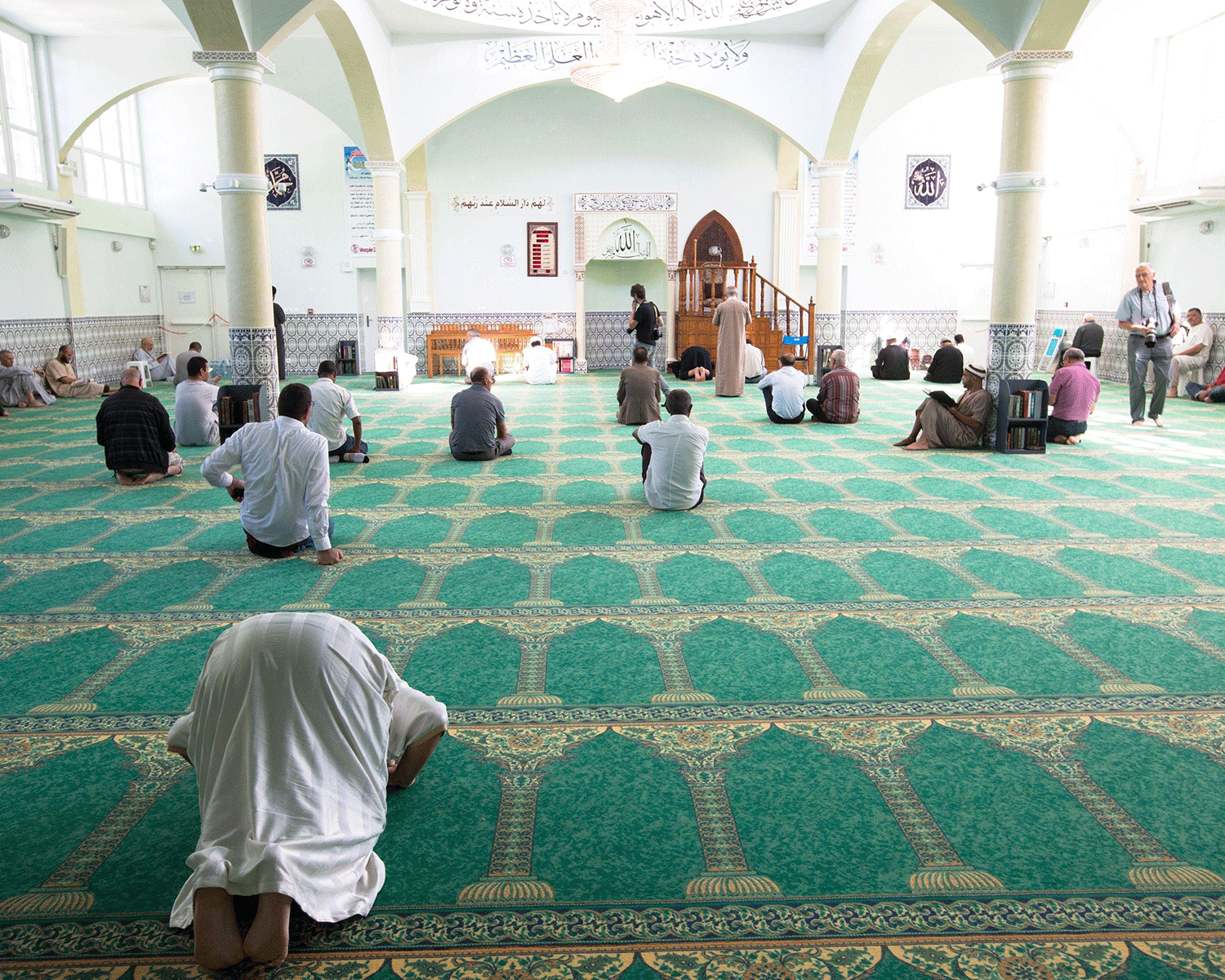 People pray at the Villefontaine mosque in France in 2015