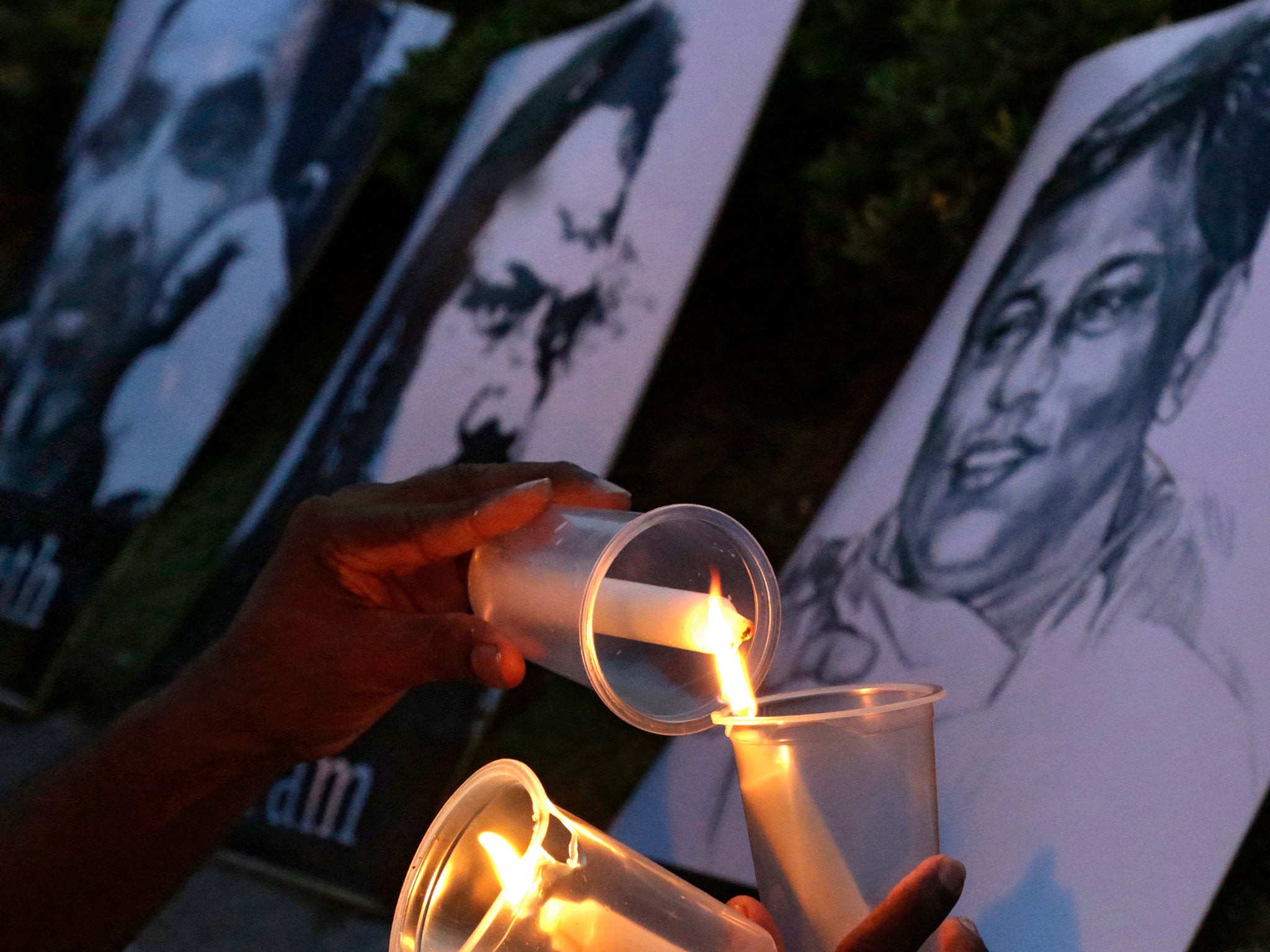 Sri Lankan journalists light candles in memory of several killed or disappeared colleagues, in Colombo