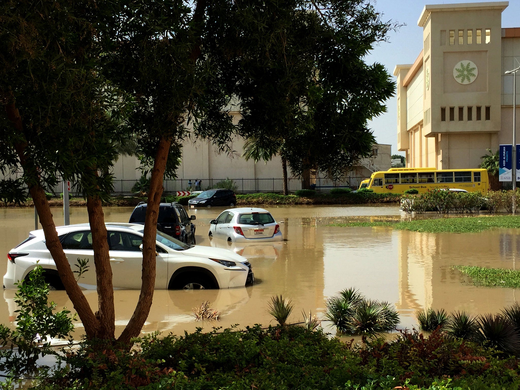 Cars are seen stuck in a flooded street in Dubai on 10 March, 2016 one day after a heavy rain storm hit the desert Gulf state, causing flights to be suspended and flooding roads