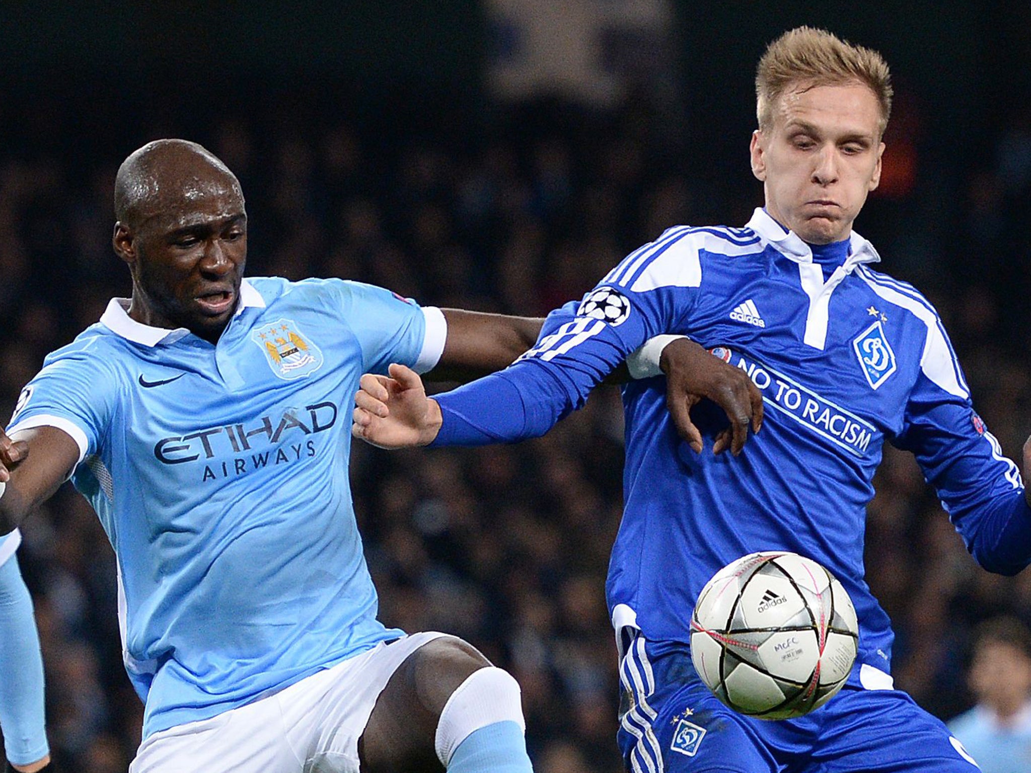 Eliaquim Mangala competes for the ball against Dynamo Kiev