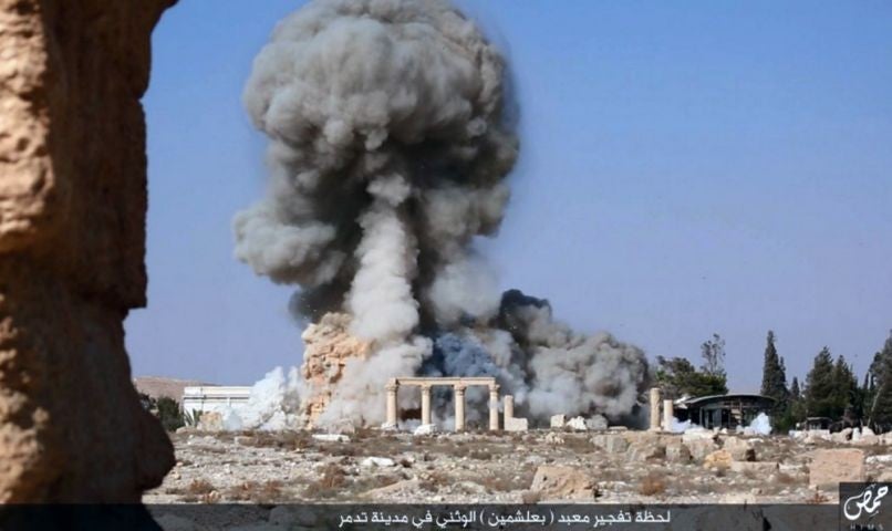 An image from social media shows smoke from the detonation of the 2,000-year-old temple of Baalshamin in Syria's ancient caravan city of Palmyra