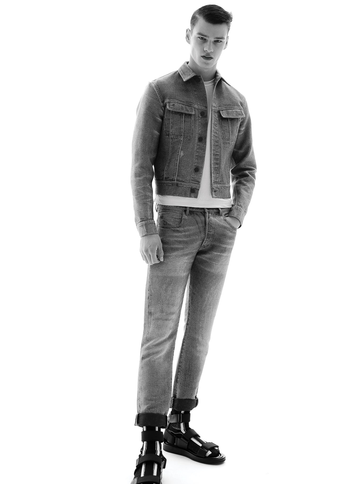 Denim jacquard jacket, £650, bonded cotton T-shirt, £495, denim jacquard trousers, £395, engineered sport socks, £495, sandals, £499, all Calvin Klein Collection