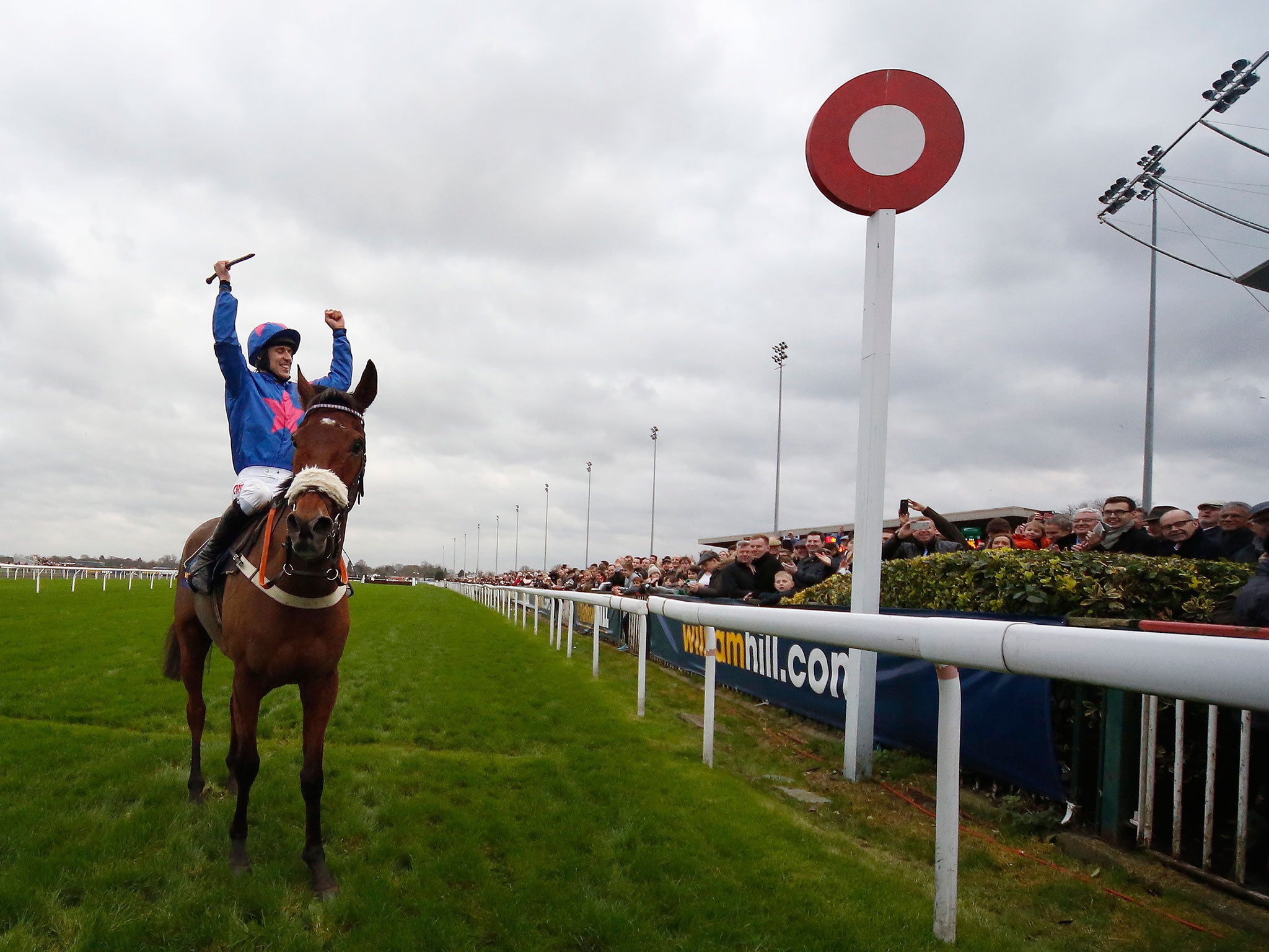 Paddy Brennan salutes the crowd at Kempton after Cue Card’s victory in the King George VI Chase