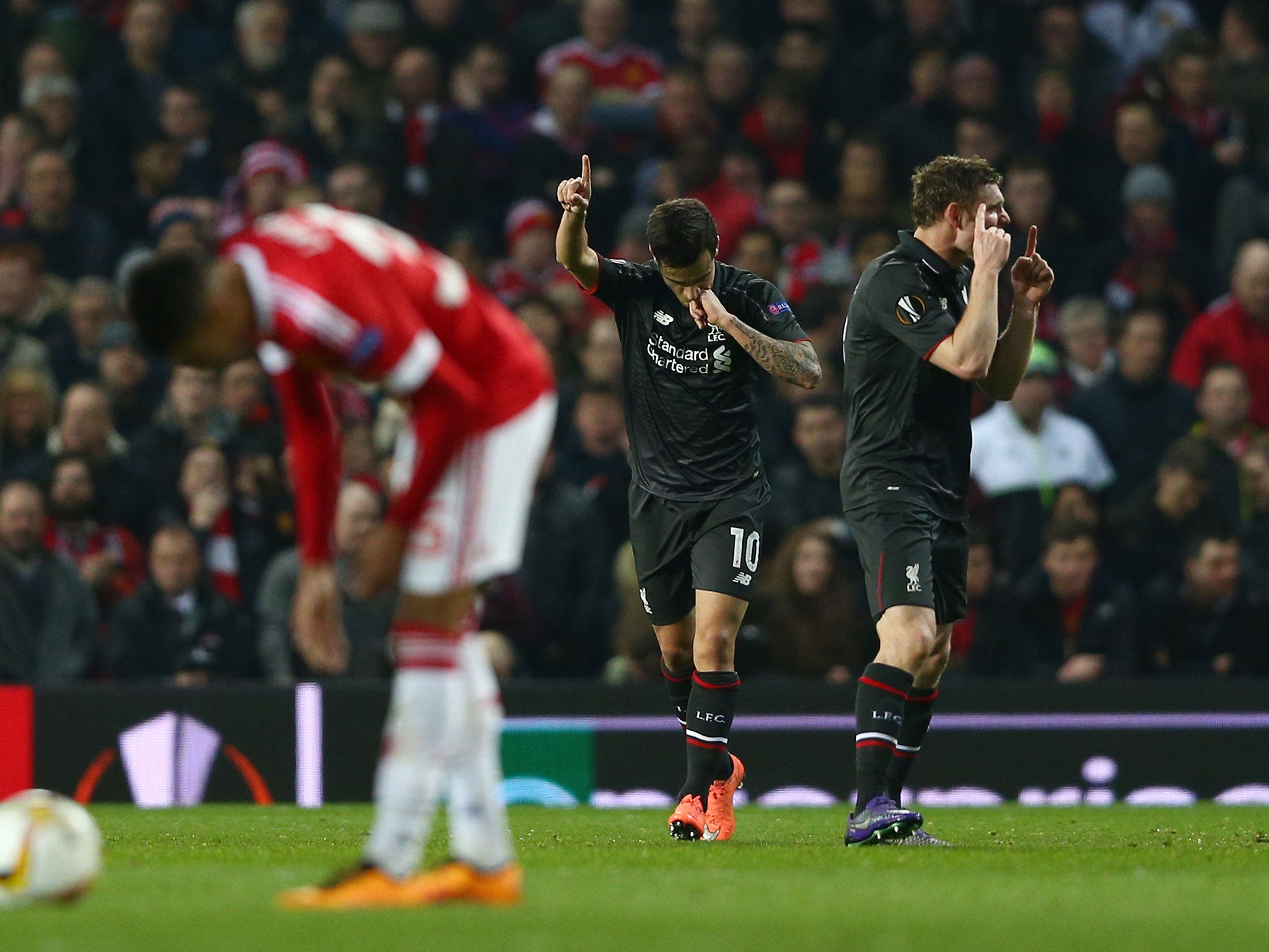 Philippe Coutinho celebrates his goal against Manchester United