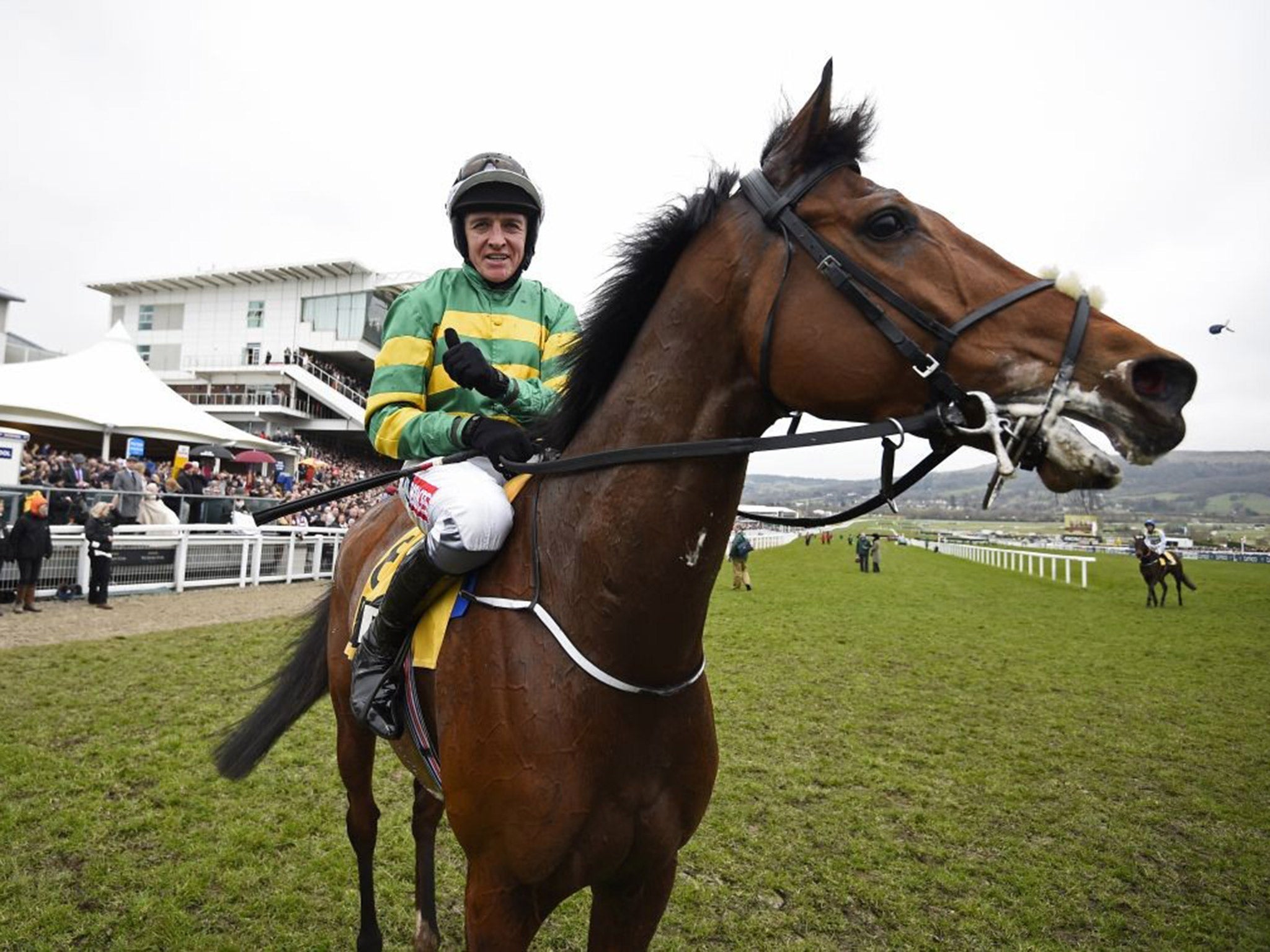 Barry Geraghty celebrates winning the Triumph Hurdle on Ivanovich Gorbatov