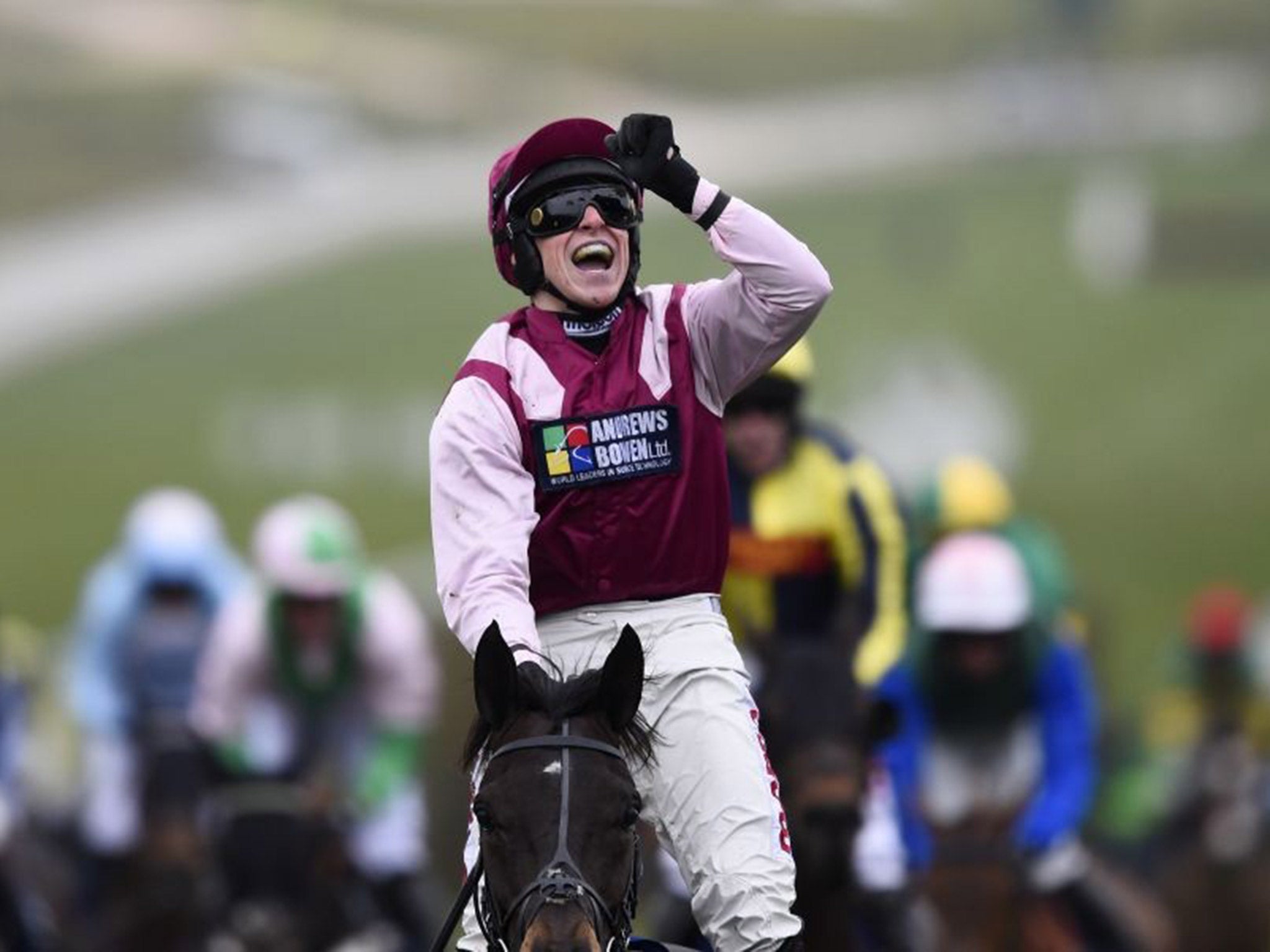 Harry Skelton celebrates winning the County Handicap Hurdle on Superb Story