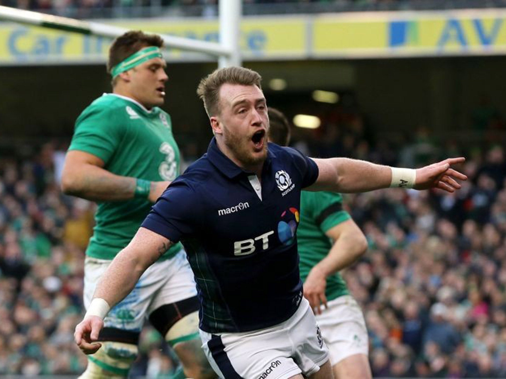 Stuart Hogg celebrates scoring a try for Scotland