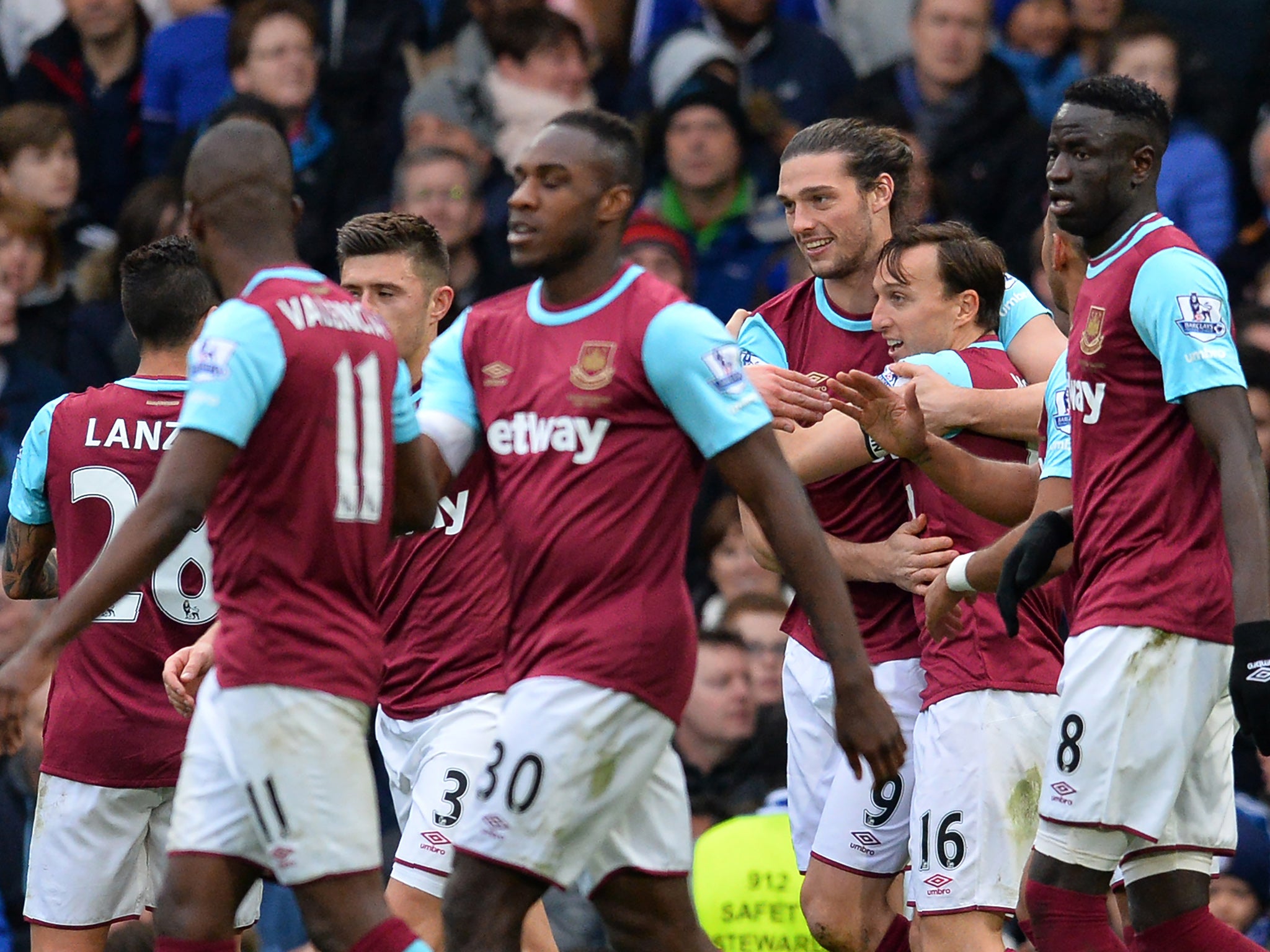 Andy Carroll's team-mates congratulate him on his goal