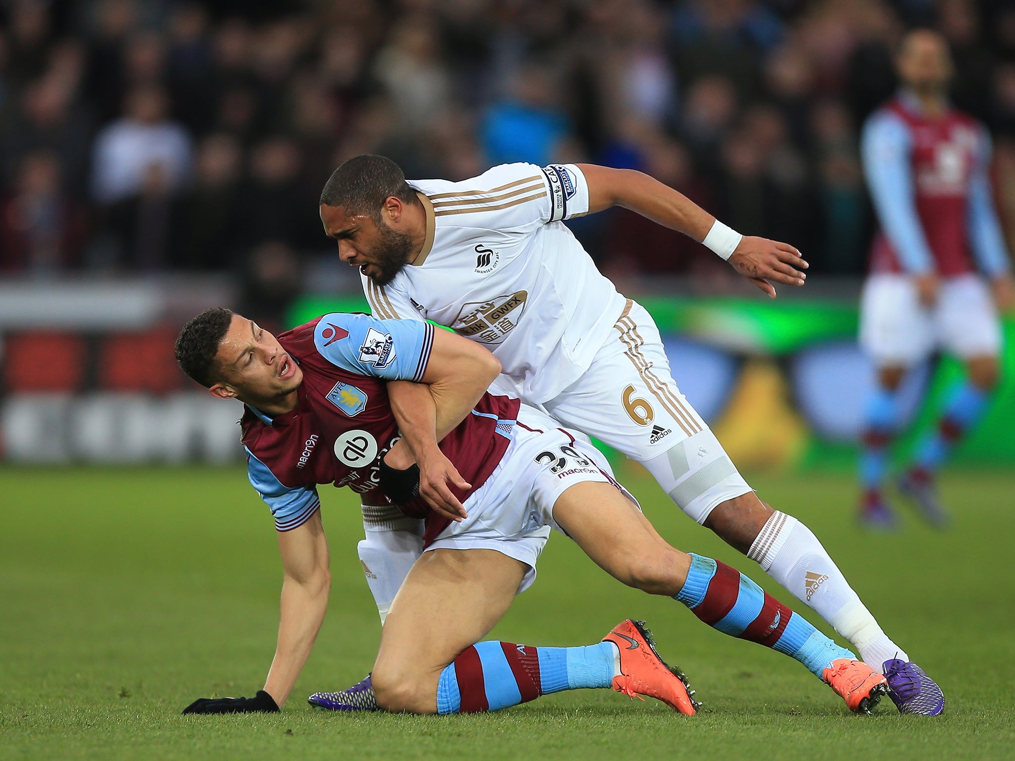 Rudy Gestede and Ashley Williams come to blows during the first half