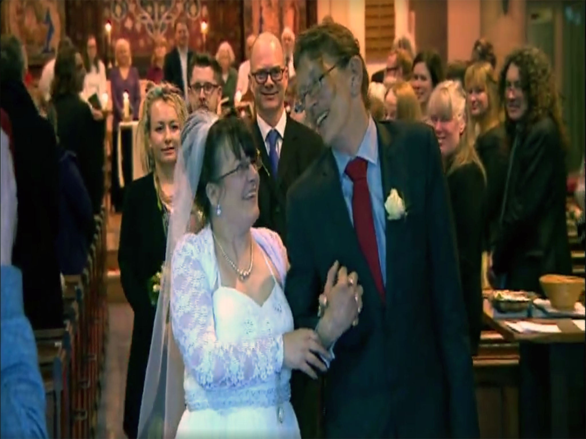 &#13;
The happy couple on their wedding day (BBC)&#13;