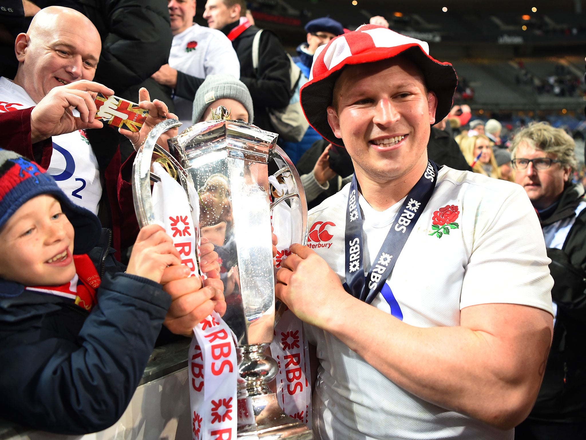 Dyan Hartley celebrates with the trophy