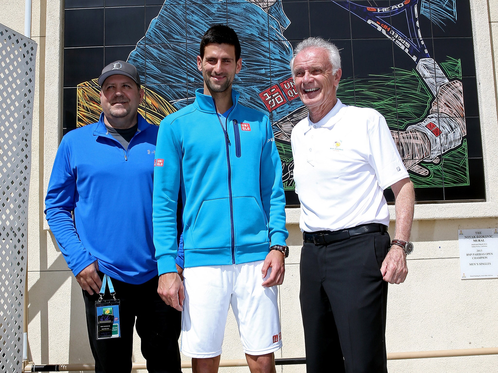 Raymond Moore (right) has apologised for his remarks about female tennis players