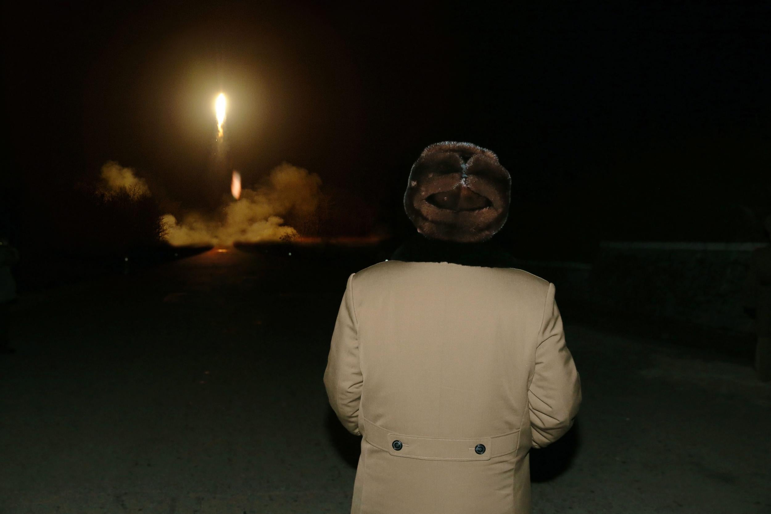 Kim Jong Un watches a missile launch (file pic)